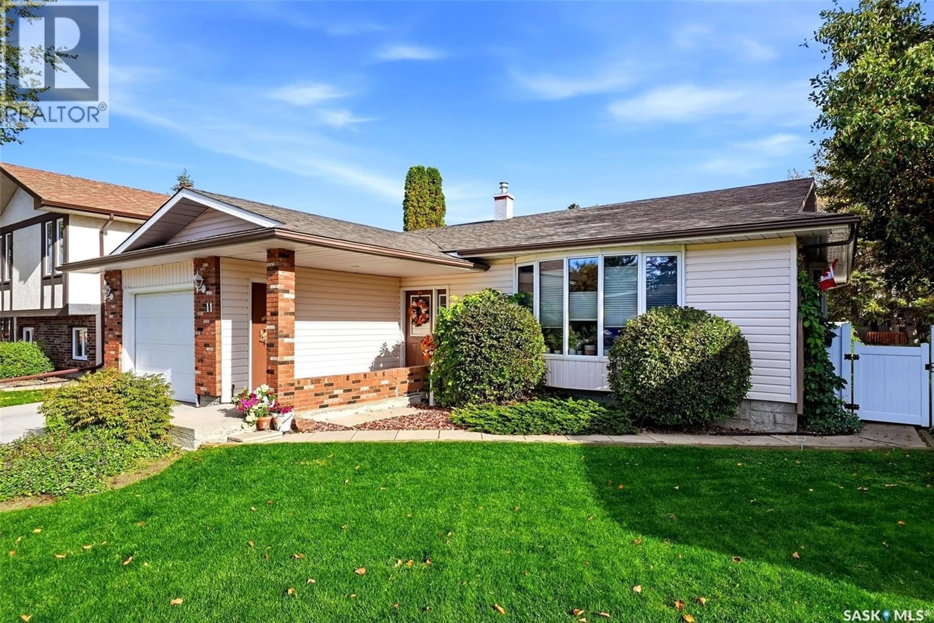 Home with vinyl exterior material, street for 11 GREEN MEADOW ROAD, Regina Saskatchewan S4V0A4