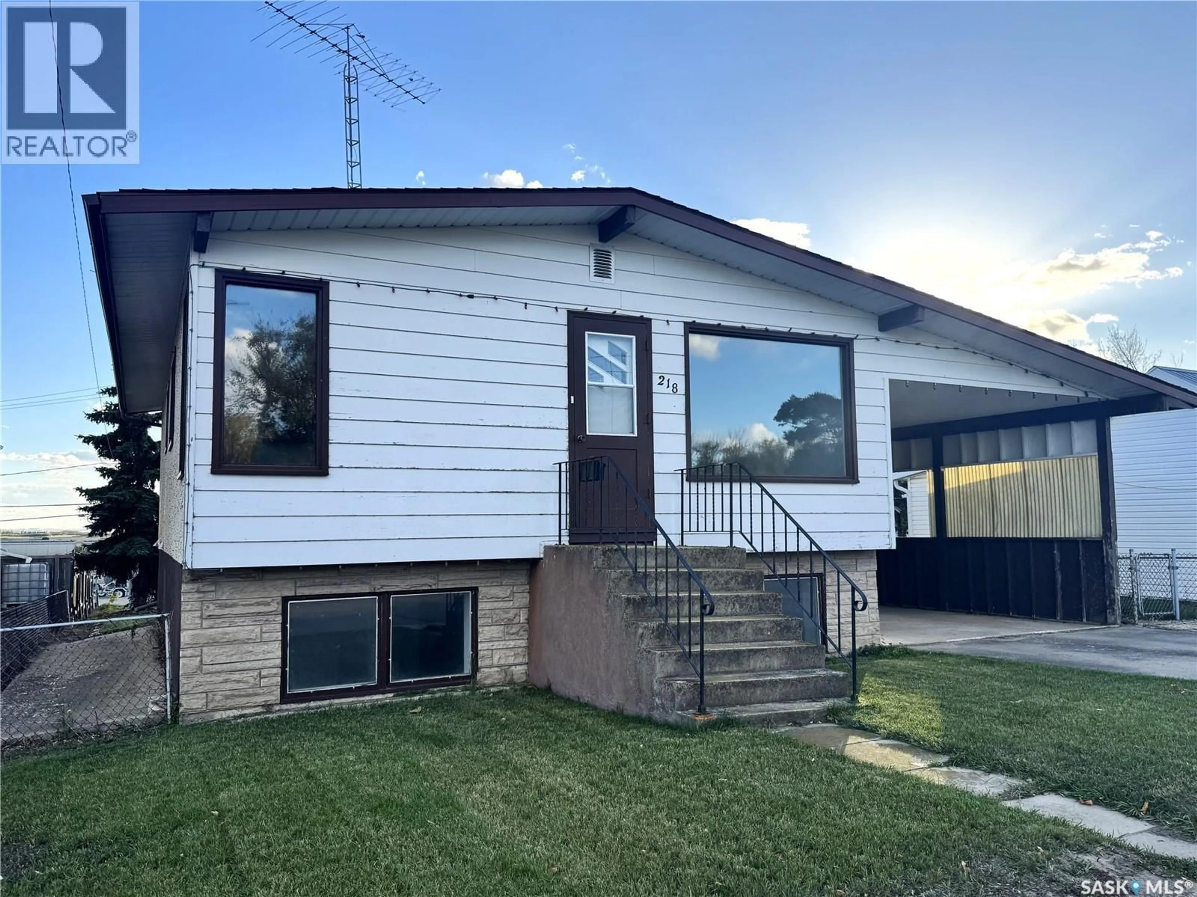 Home with vinyl exterior material, unknown for 218 2ND AVENUE, Biggar Saskatchewan S0K0M0