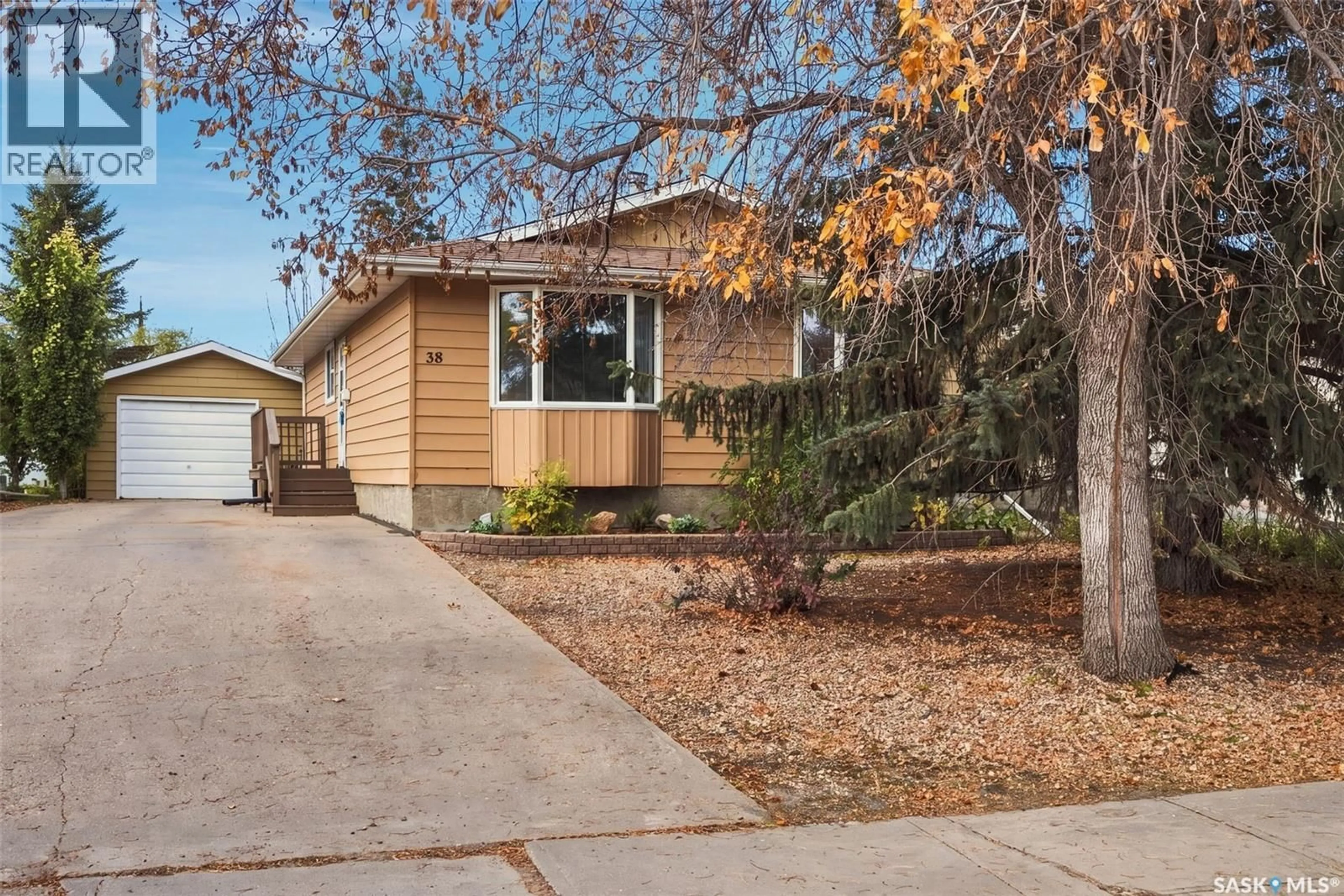 Home with vinyl exterior material, street for 38 PETERSMEYER STREET, Regina Saskatchewan S4R7P7