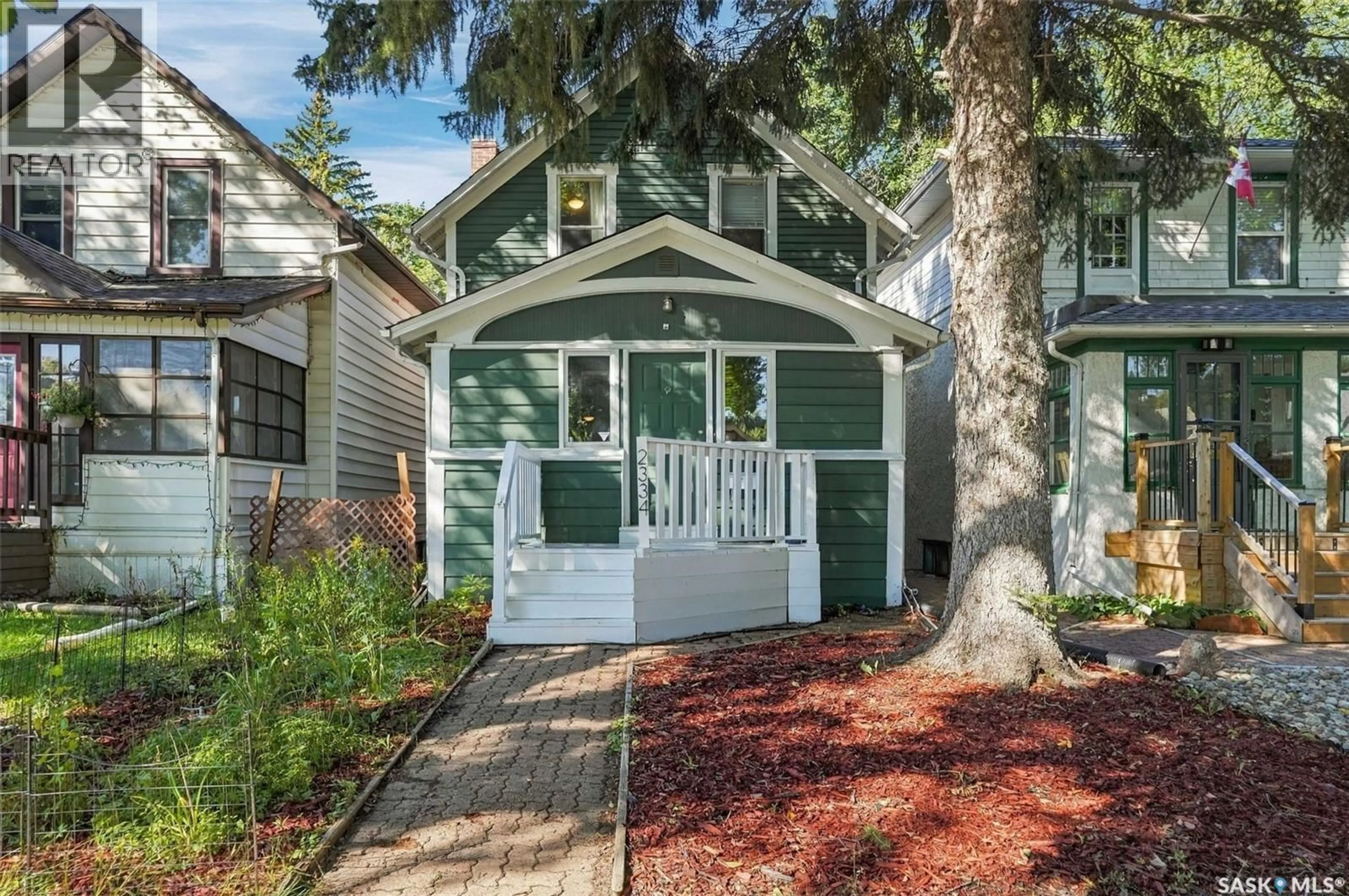 Home with vinyl exterior material, street for 2334 GARNET STREET, Regina Saskatchewan S4T3A2
