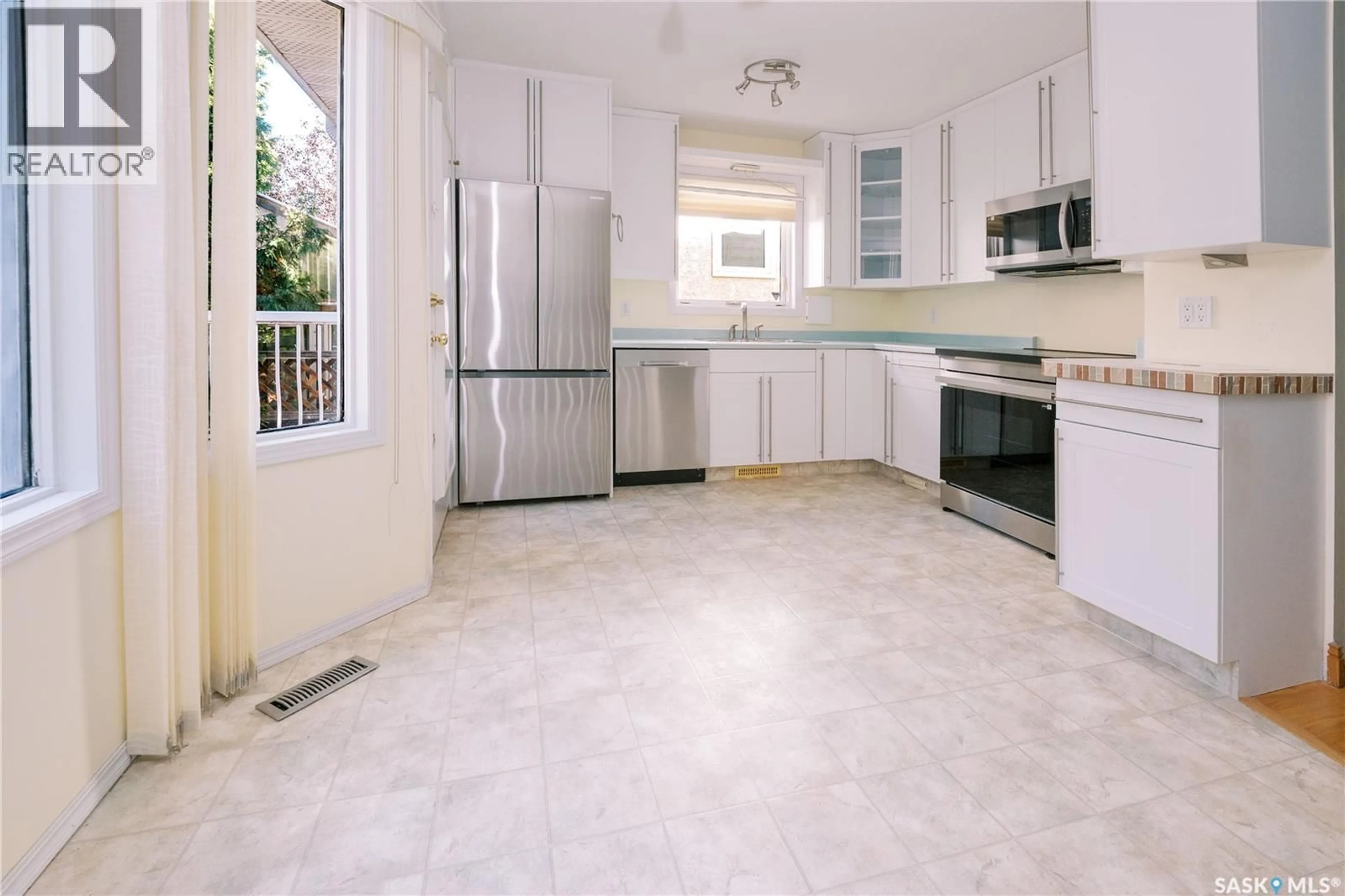 Standard kitchen, ceramic/tile floor for 939 HASLAM CRESCENT, Saskatoon Saskatchewan S7S1C8