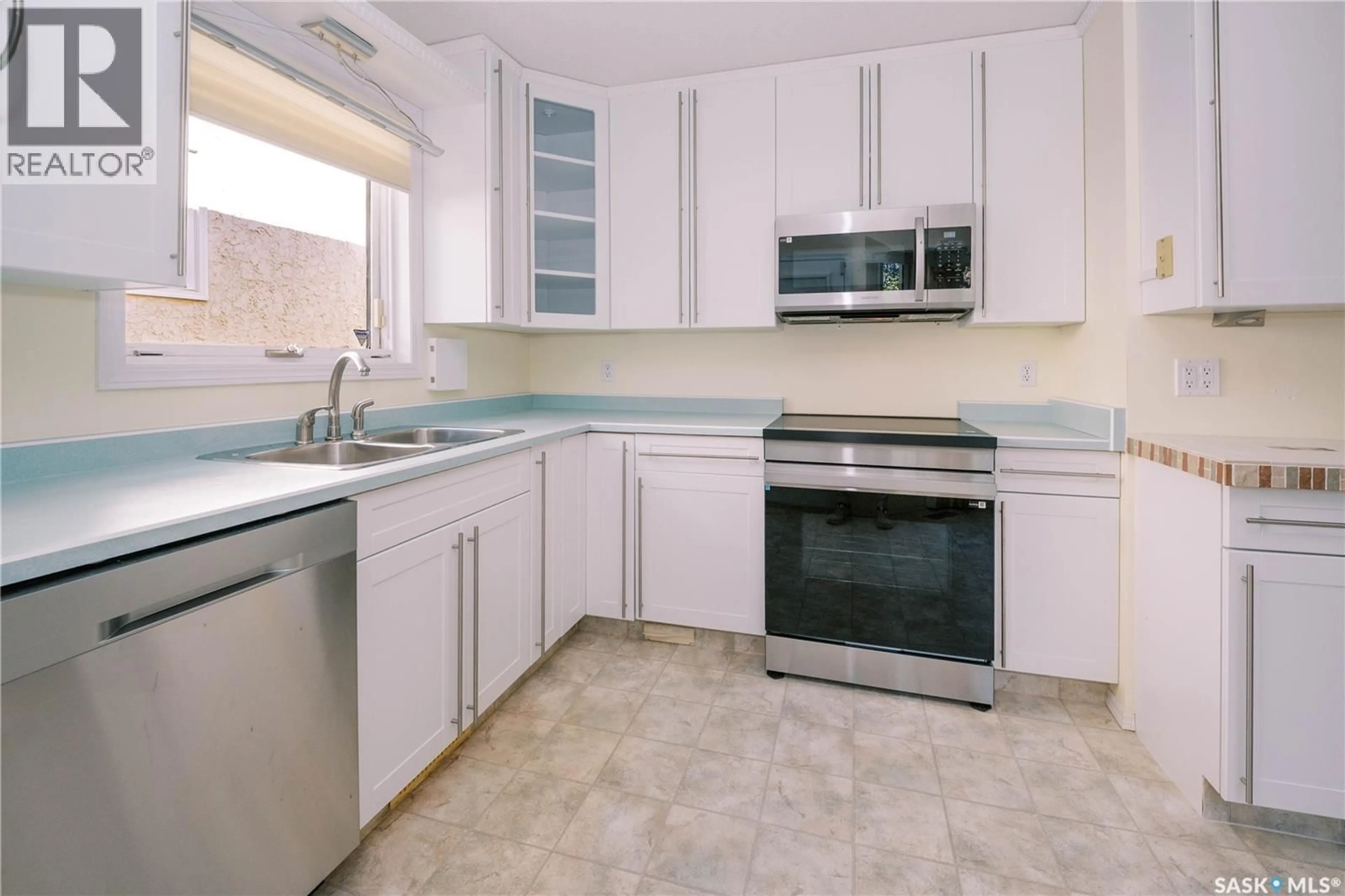 Standard kitchen, ceramic/tile floor for 939 HASLAM CRESCENT, Saskatoon Saskatchewan S7S1C8