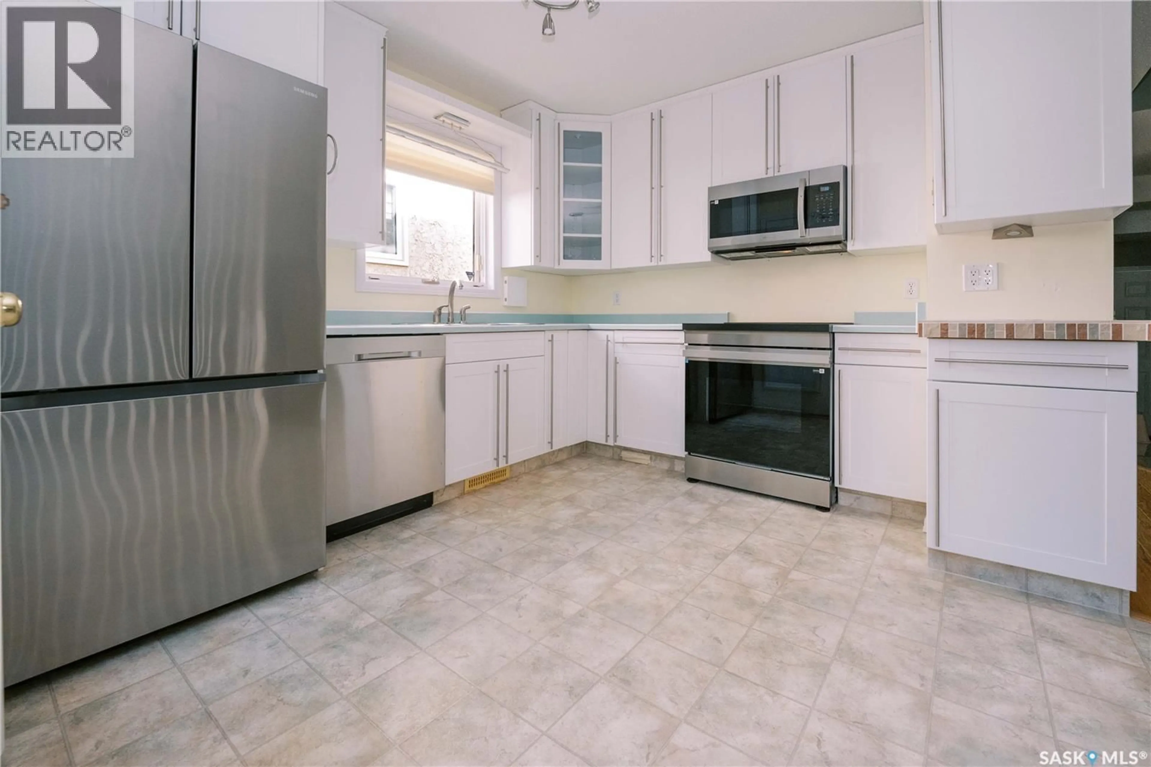 Standard kitchen, ceramic/tile floor for 939 HASLAM CRESCENT, Saskatoon Saskatchewan S7S1C8