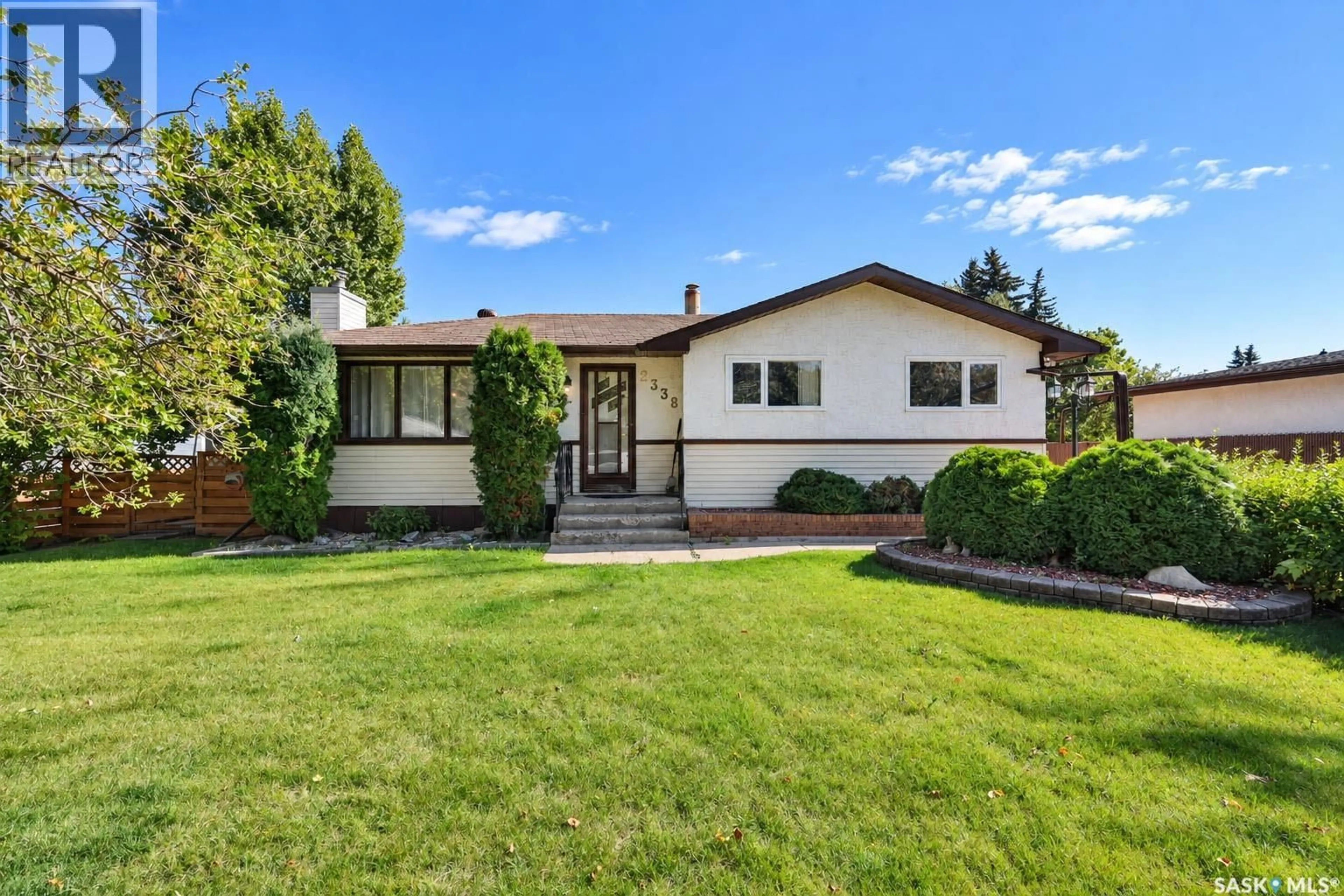 Home with vinyl exterior material, street for 2338 MCDONALD AVENUE, Prince Albert Saskatchewan S6V2V6