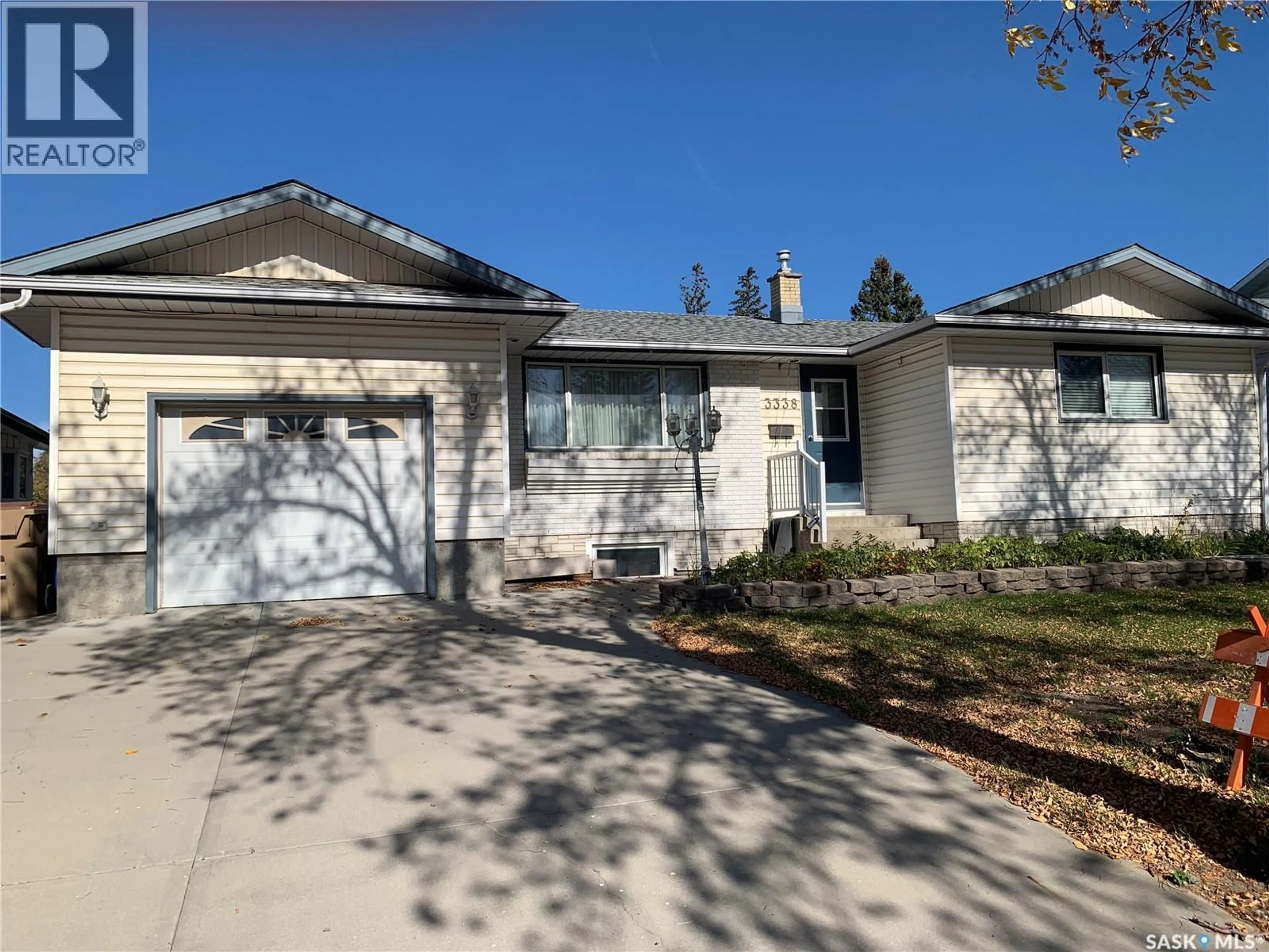 Home with vinyl exterior material, street for 3338 GORDON ROAD, Regina Saskatchewan S4S2T9