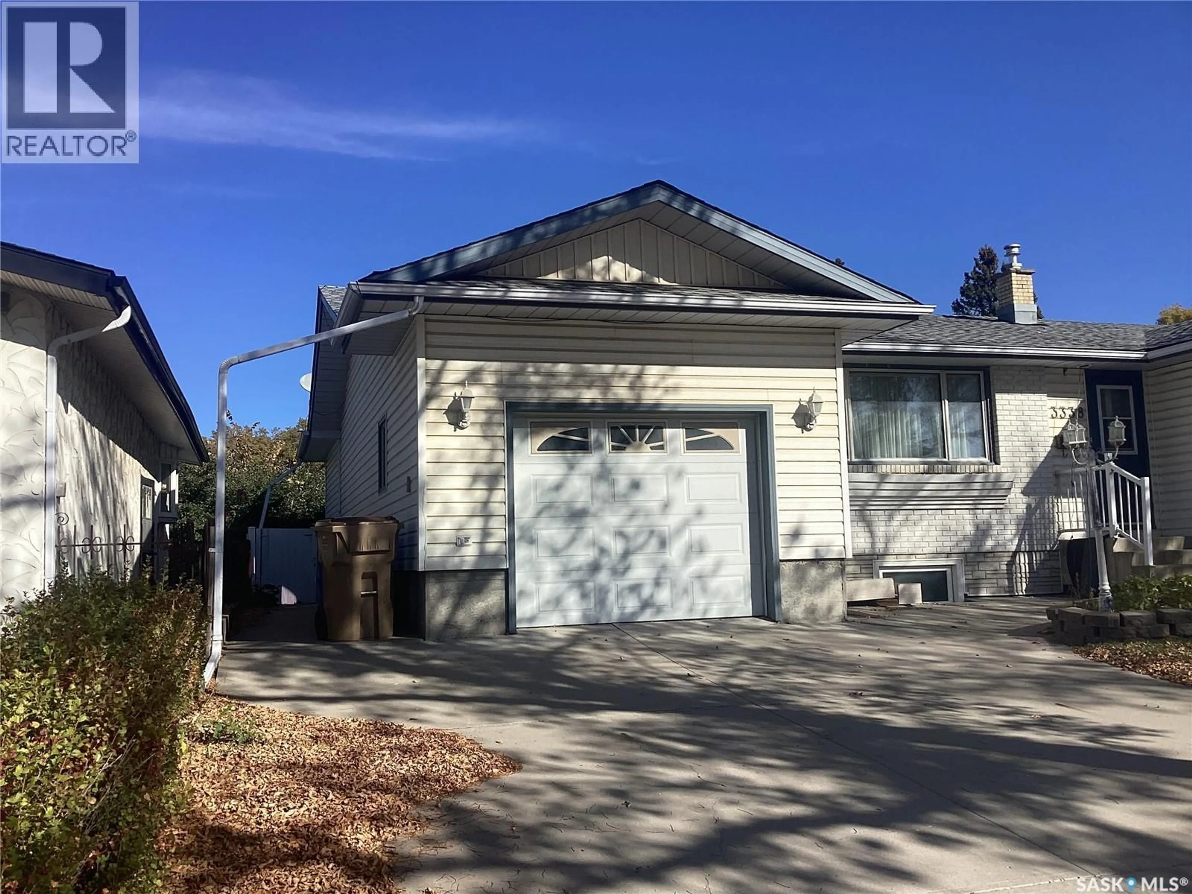 Home with vinyl exterior material, street for 3338 GORDON ROAD, Regina Saskatchewan S4S2T9