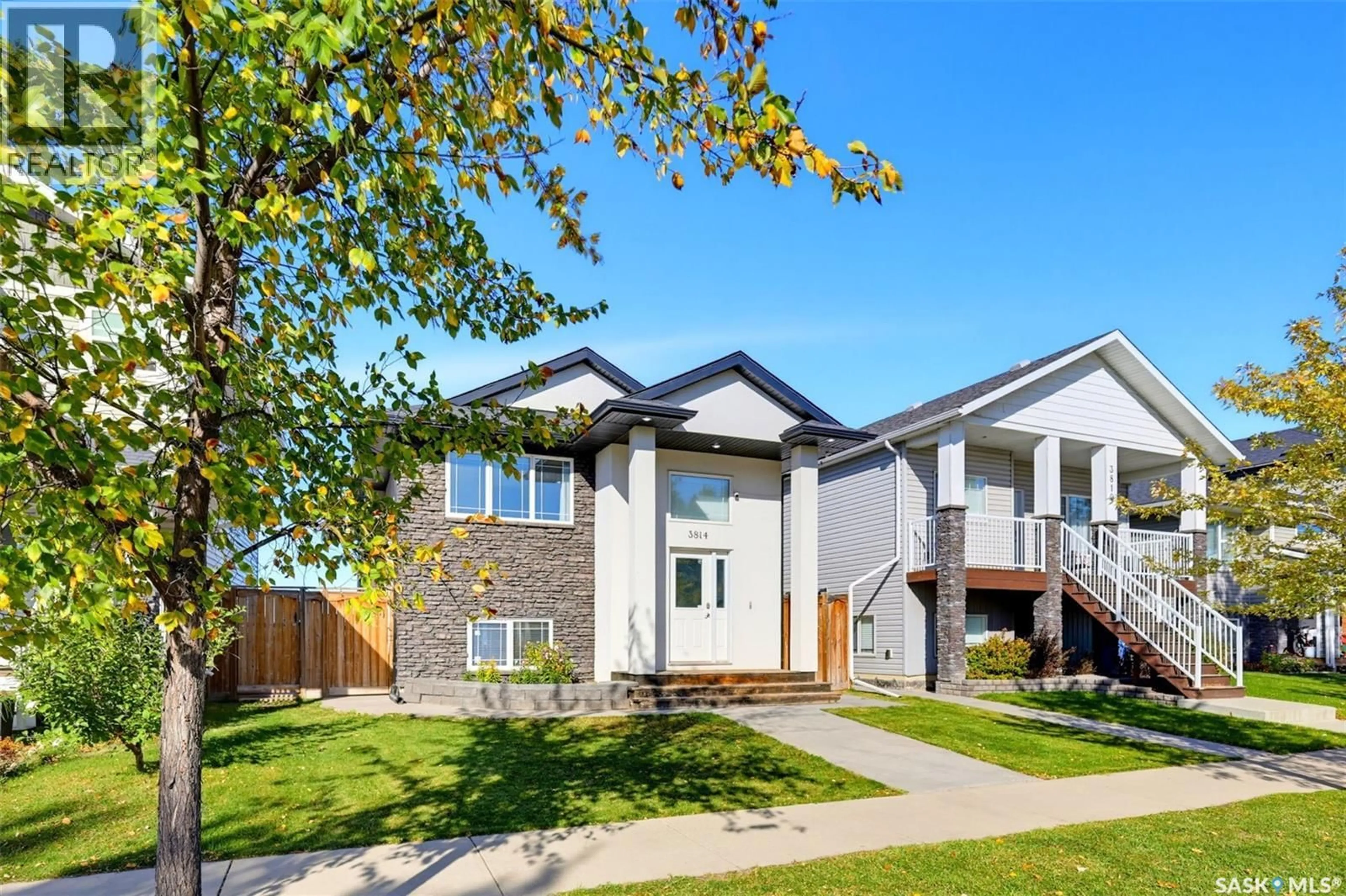 Home with vinyl exterior material, street for 3814 33RD STREET, Saskatoon Saskatchewan S7R0M1