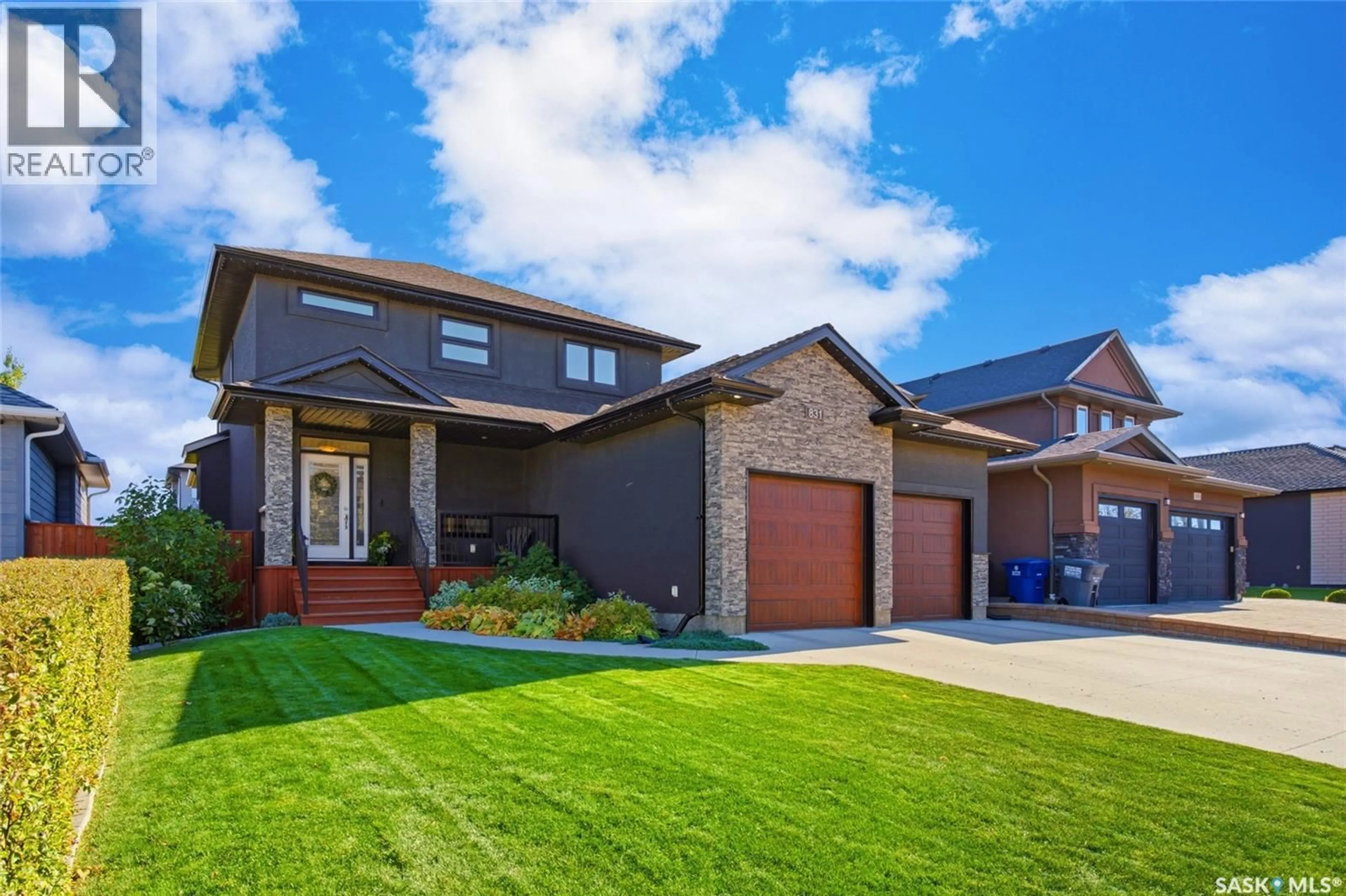Home with brick exterior material, street for 831 SALLOUM CRESCENT, Saskatoon Saskatchewan S7W0N2