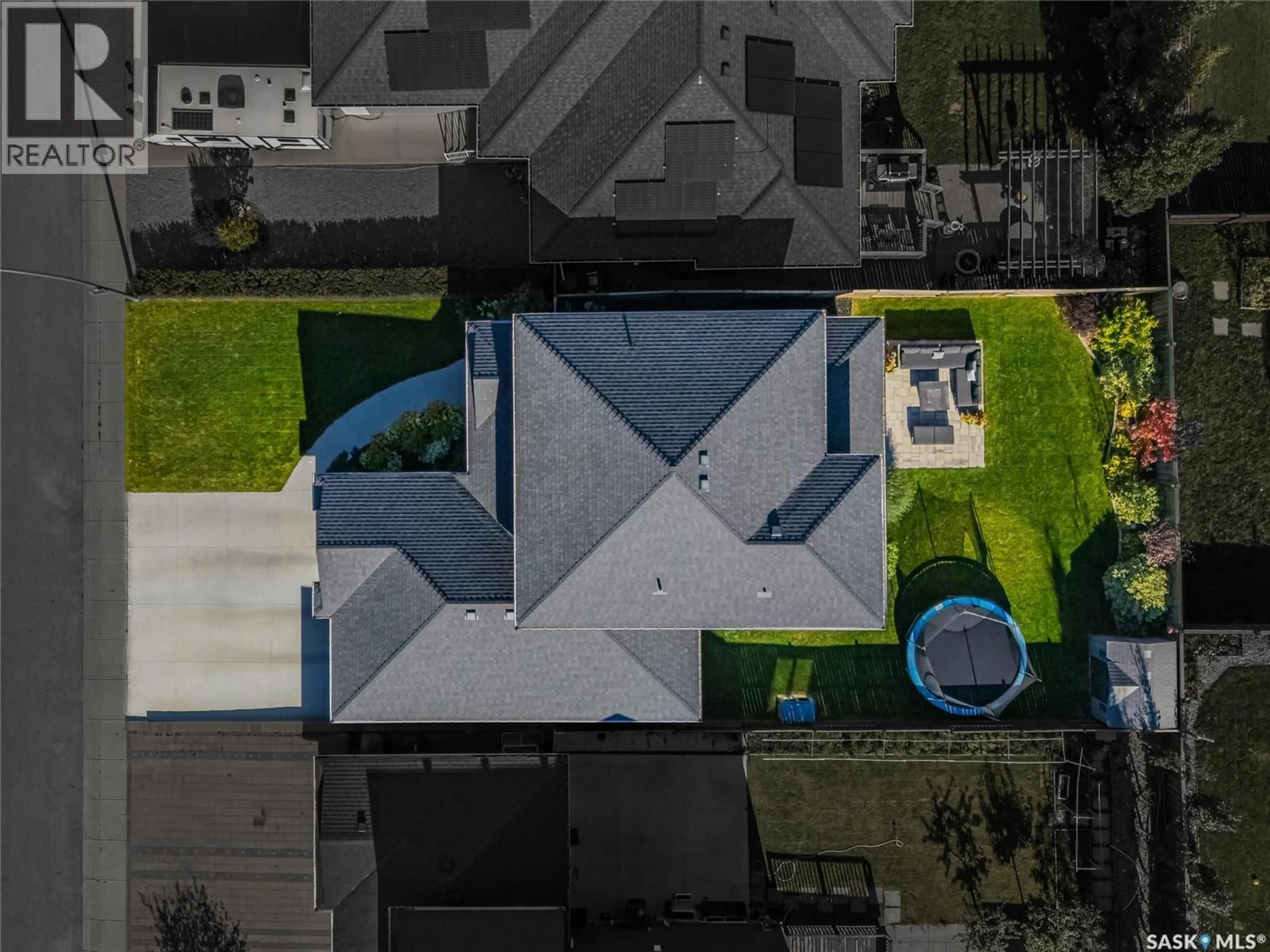 A pic from outside/outdoor area/front of a property/back of a property/a pic from drone, street for 831 SALLOUM CRESCENT, Saskatoon Saskatchewan S7W0N2