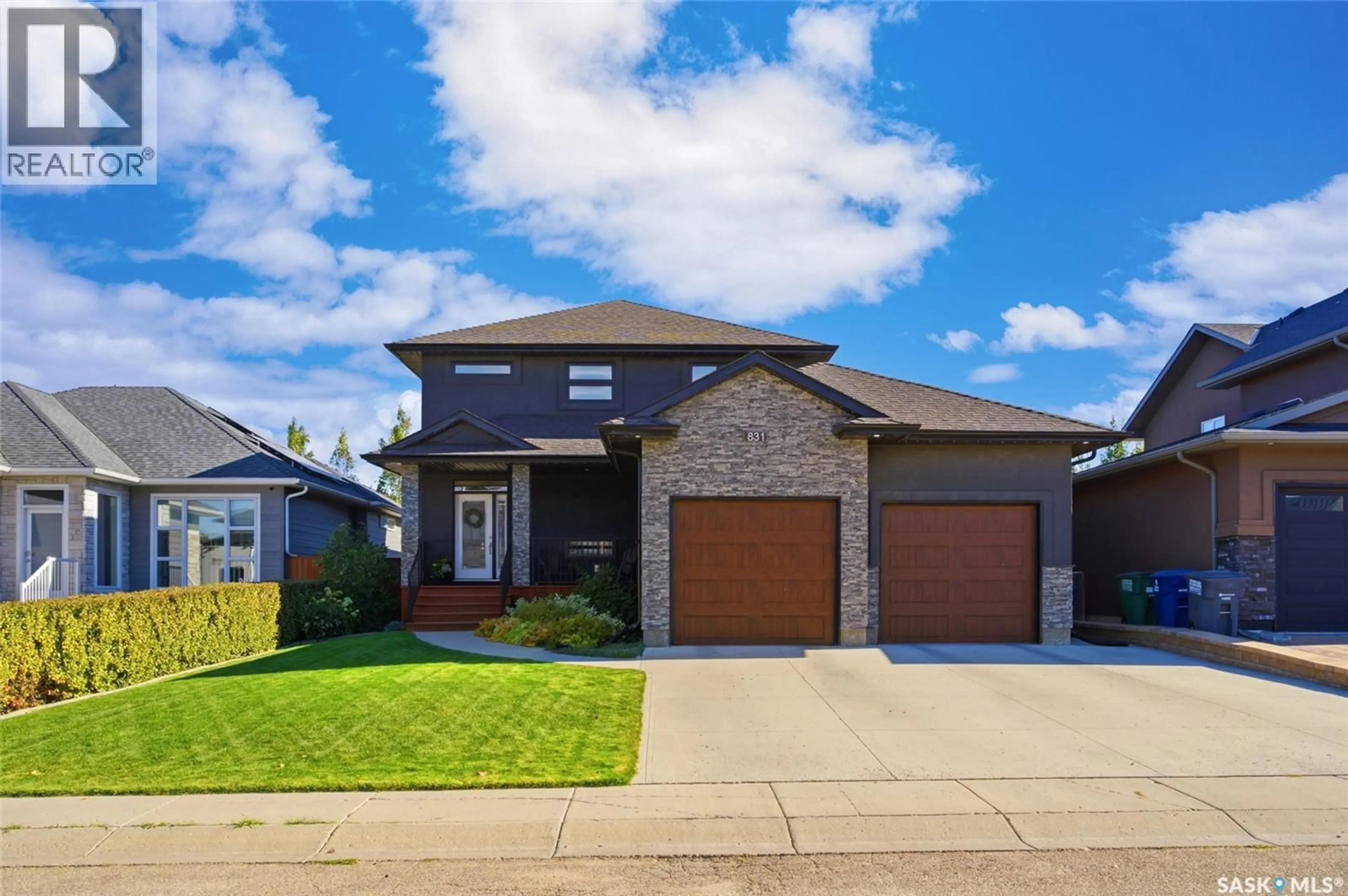 Home with brick exterior material, street for 831 SALLOUM CRESCENT, Saskatoon Saskatchewan S7W0N2