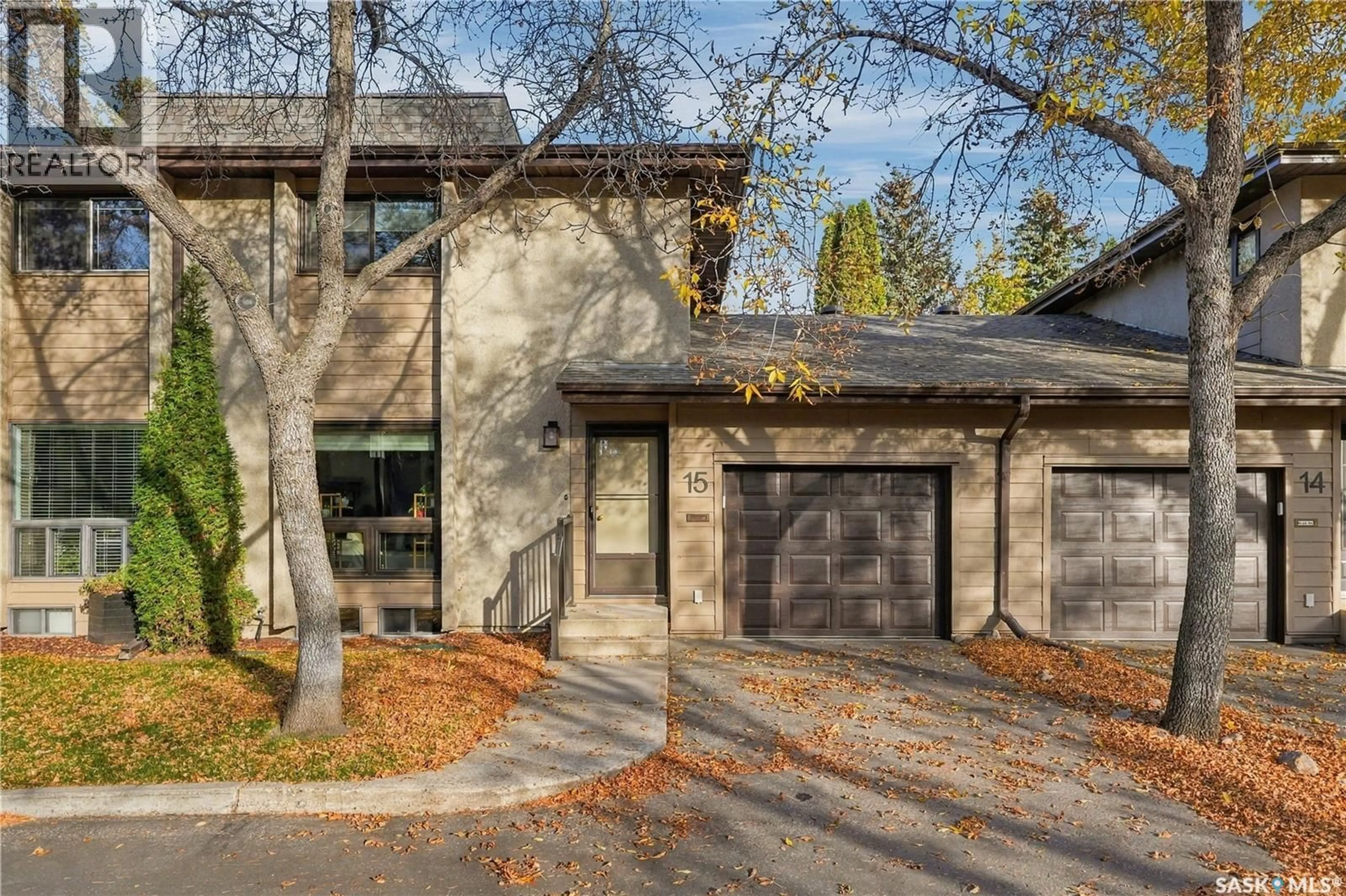 Home with brick exterior material, street for 15 PINEHOUSE DRIVE, Saskatoon Saskatchewan S7K5K2