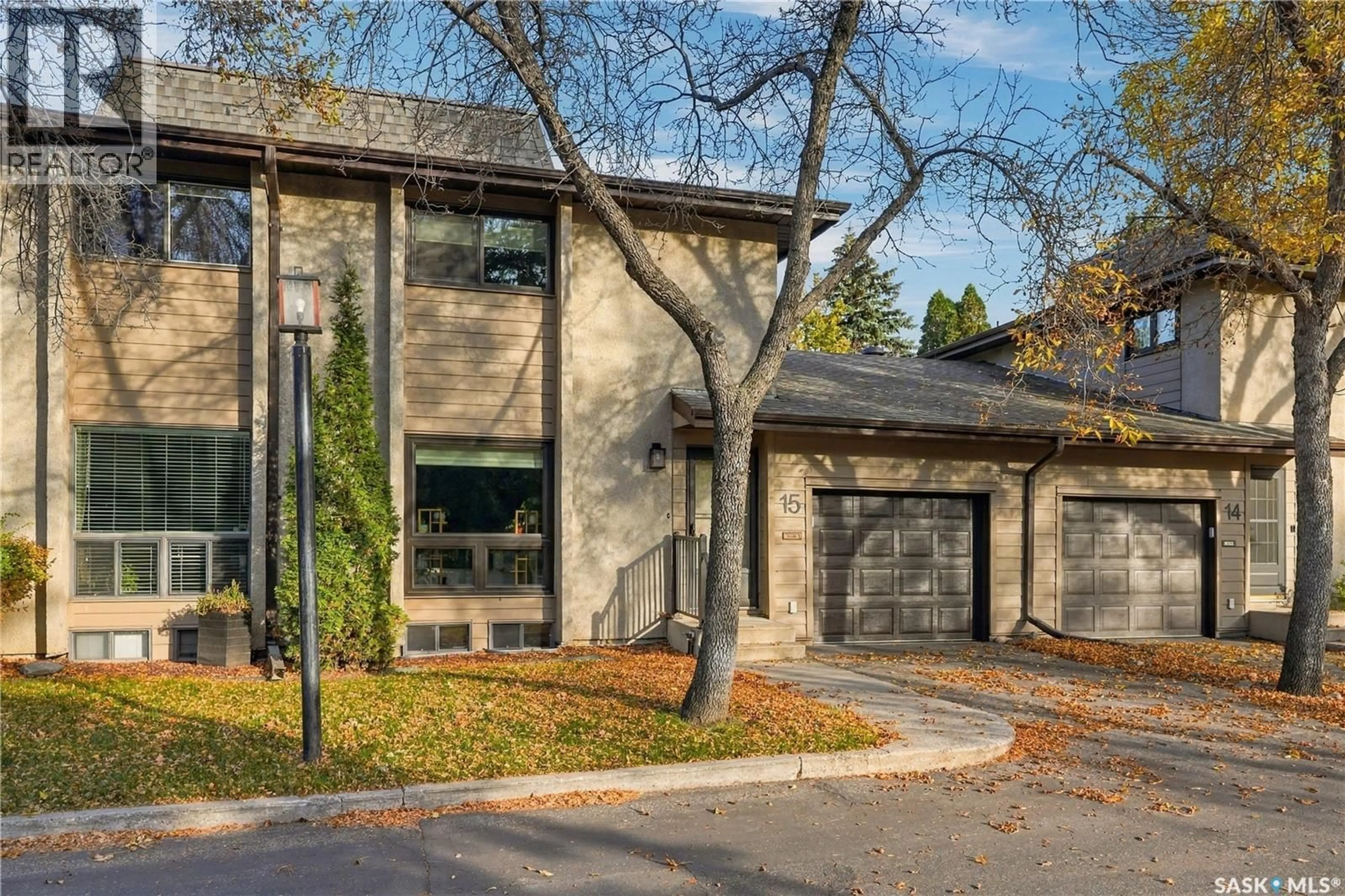Home with brick exterior material, street for 15 PINEHOUSE DRIVE, Saskatoon Saskatchewan S7K5K2