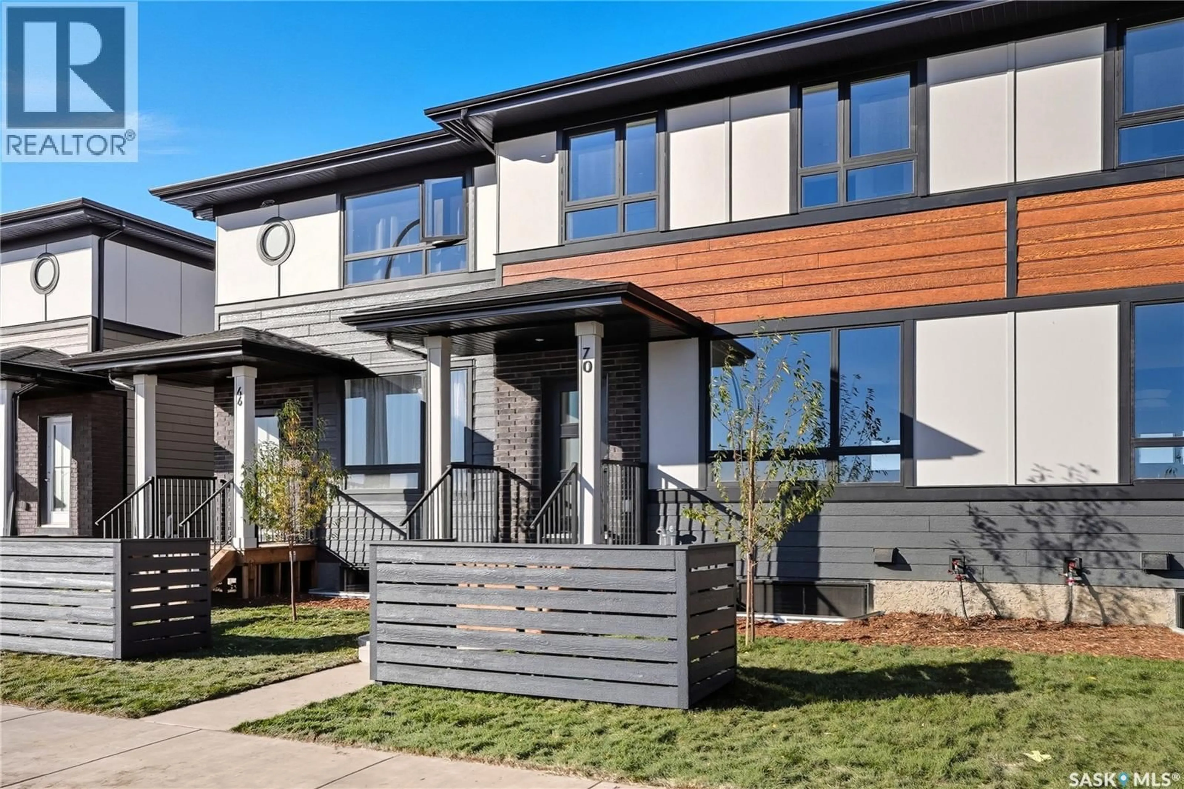 Home with brick exterior material, street for 22 TASKAMANWA TERRACE, Saskatoon Saskatchewan S7V1Z7