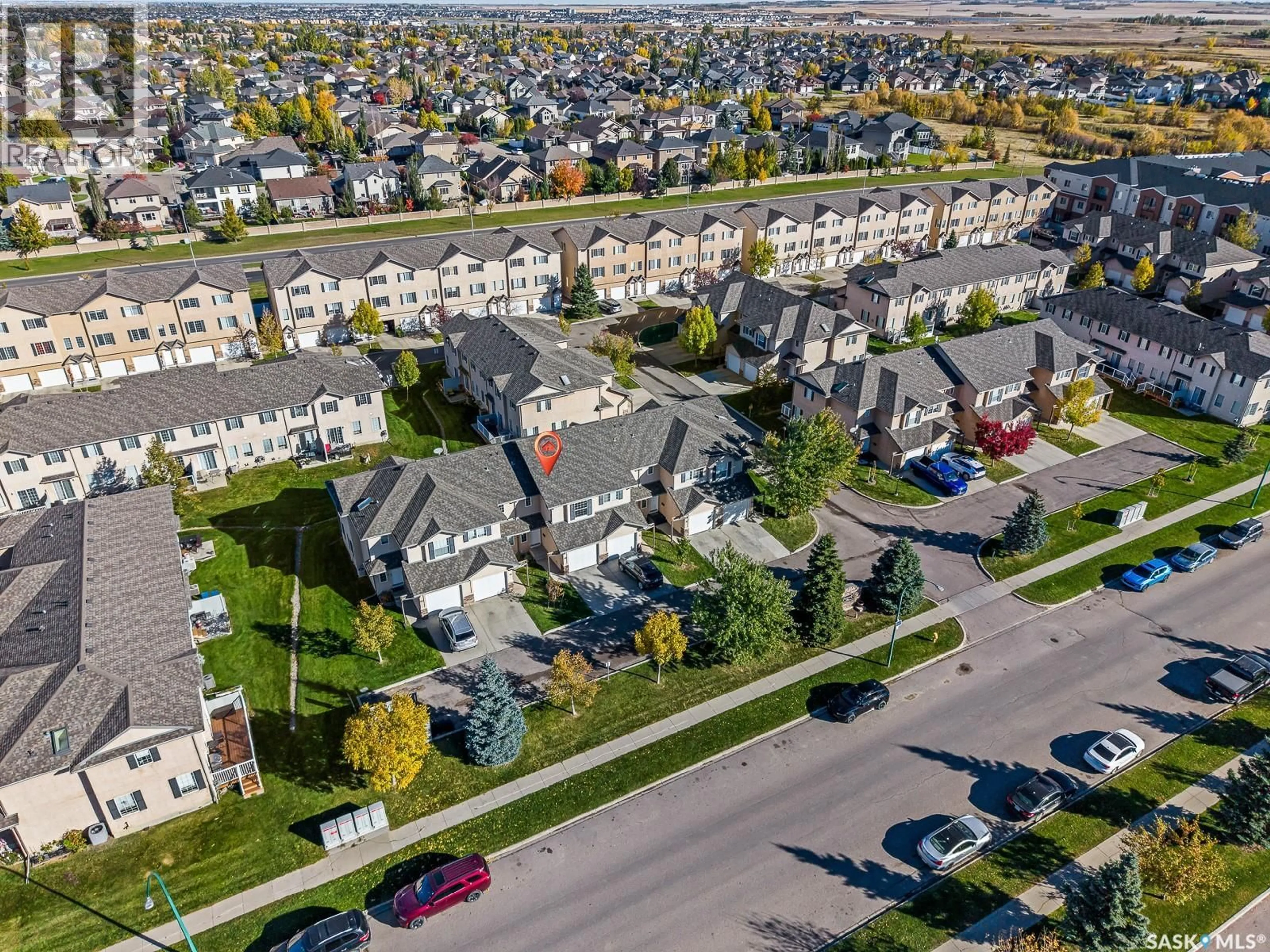 A pic from outside/outdoor area/front of a property/back of a property/a pic from drone, street for 118 - 98 PAWLYCHENKO LANE, Saskatoon Saskatchewan S7V1K1