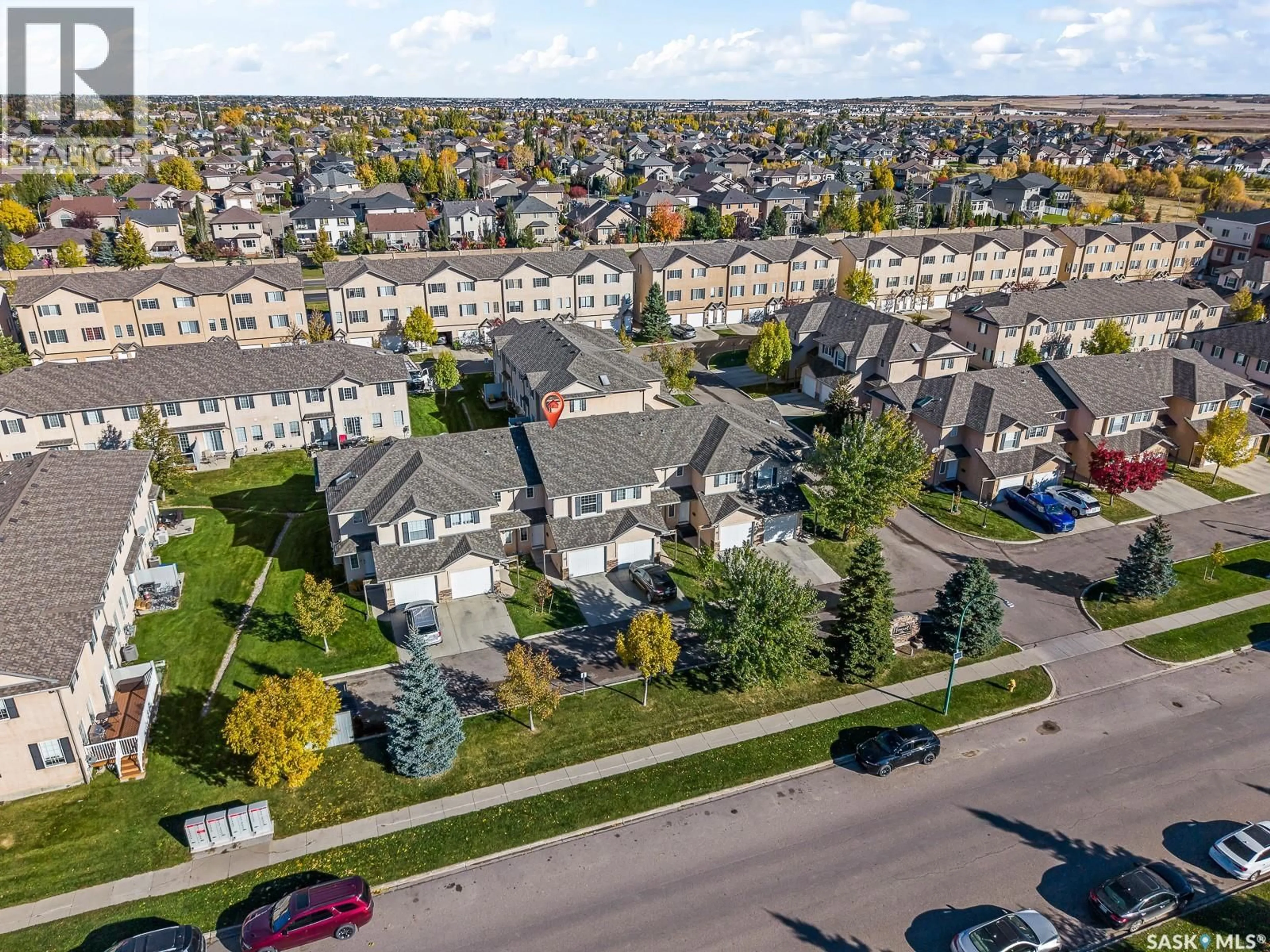 A pic from outside/outdoor area/front of a property/back of a property/a pic from drone, street for 118 - 98 PAWLYCHENKO LANE, Saskatoon Saskatchewan S7V1K1