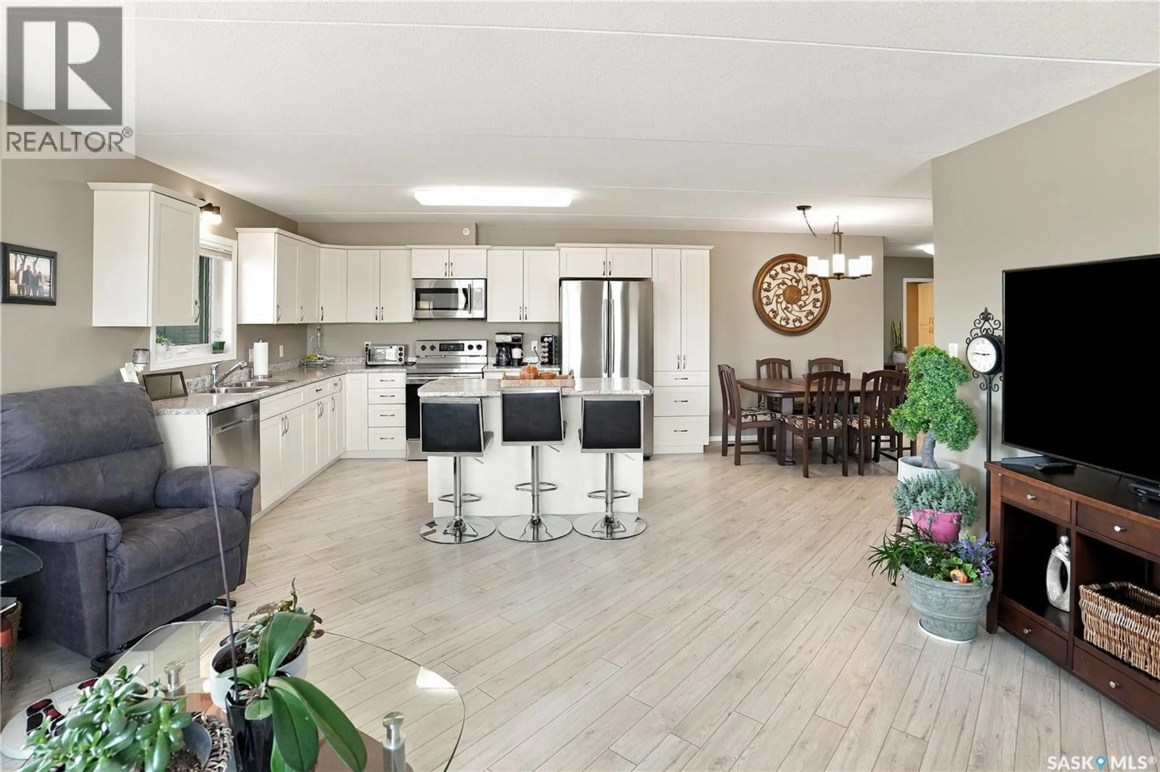 Open concept kitchen, ceramic/tile floor for 203 - 2426 BUHLER AVENUE, North Battleford Saskatchewan S9A1R5