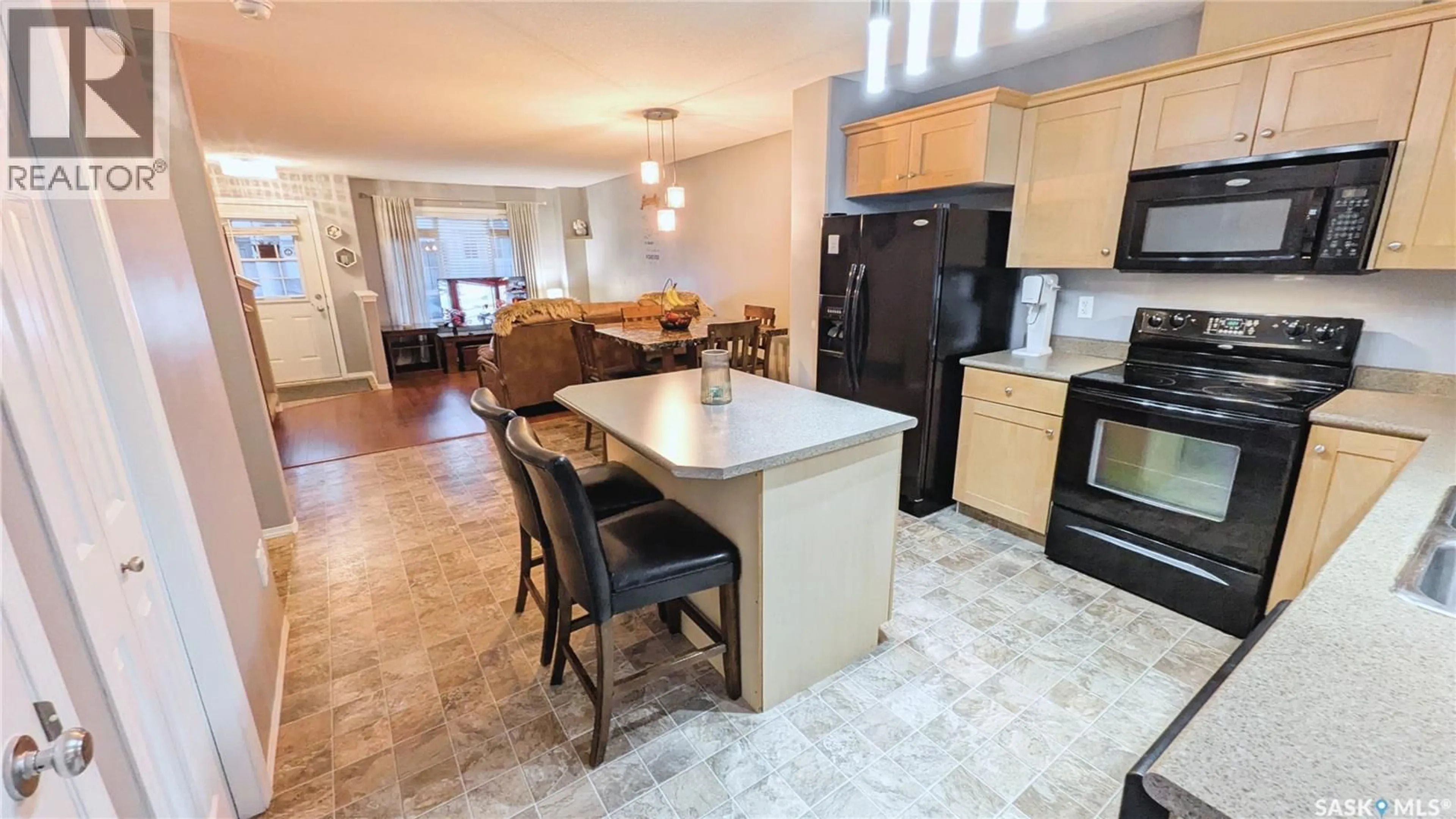 Open concept kitchen, ceramic/tile floor for 53 2751 WINDSOR PARK ROAD, Regina Saskatchewan S4V1H1