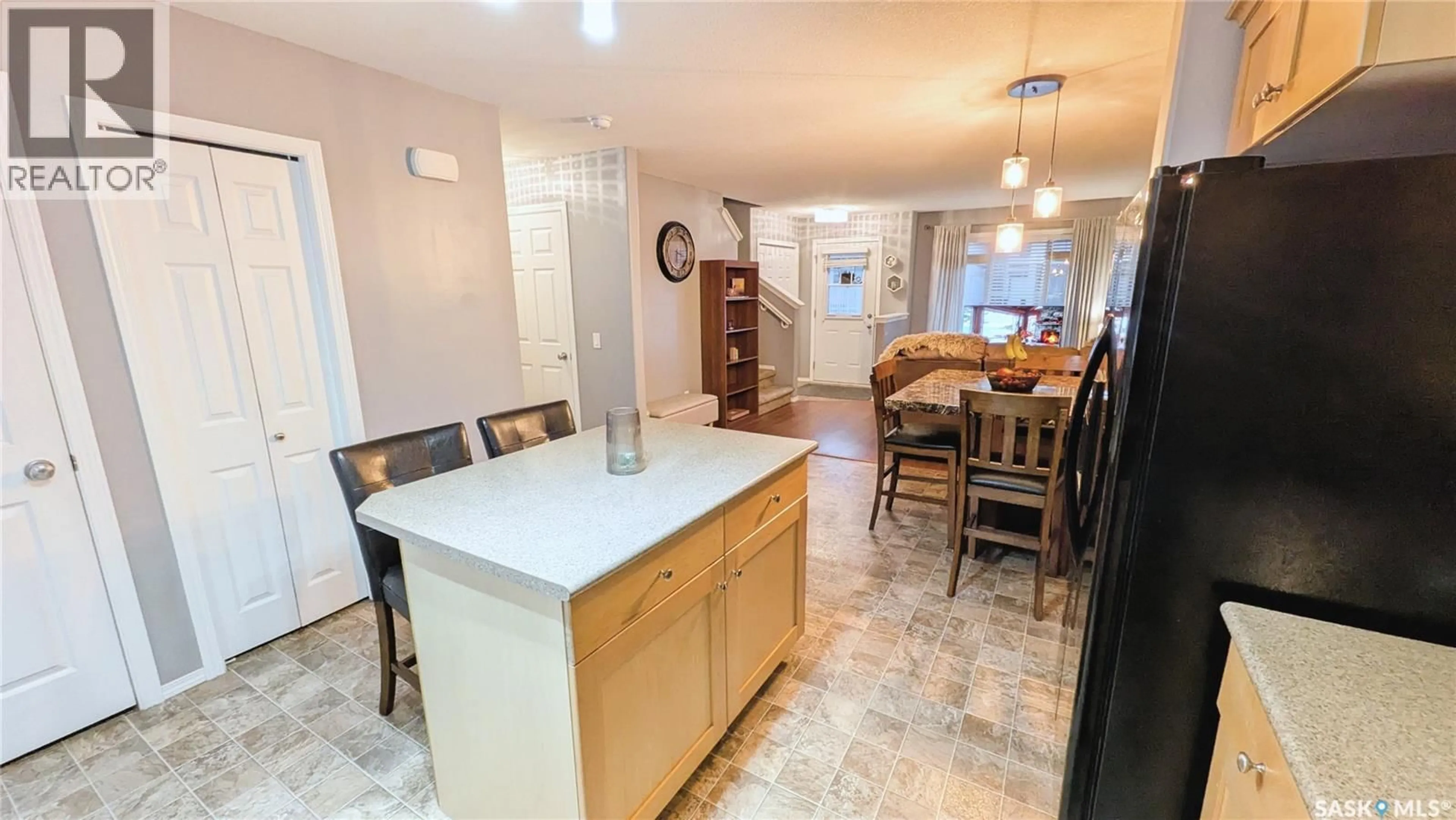 Open concept kitchen, ceramic/tile floor for 53 2751 WINDSOR PARK ROAD, Regina Saskatchewan S4V1H1