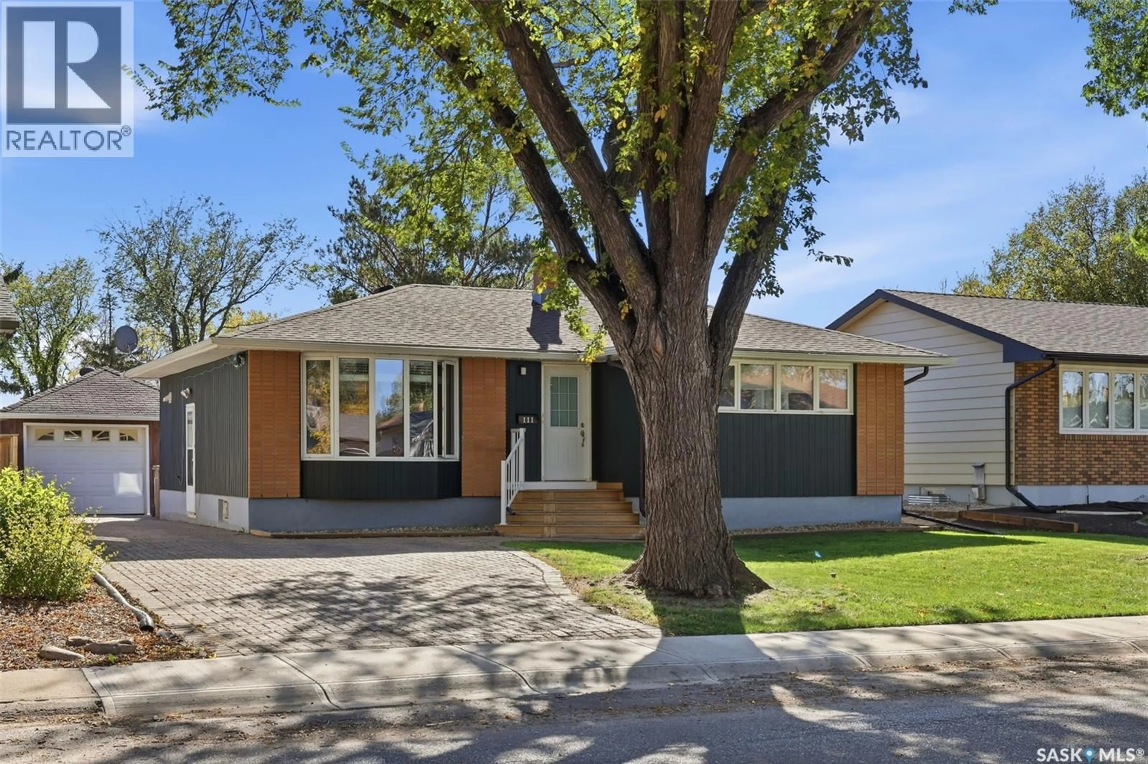 Home with vinyl exterior material, street for 111 ELMVIEW ROAD, Regina Saskatchewan S4R0B5