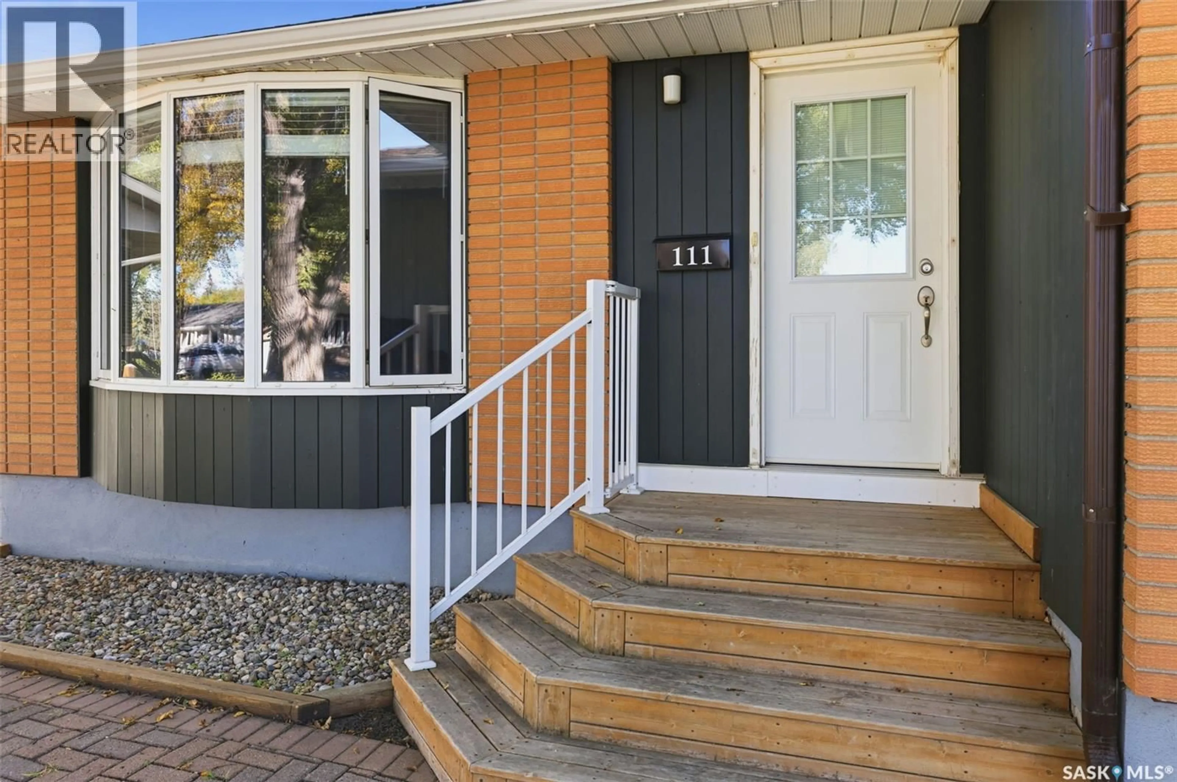 Home with vinyl exterior material, street for 111 ELMVIEW ROAD, Regina Saskatchewan S4R0B5