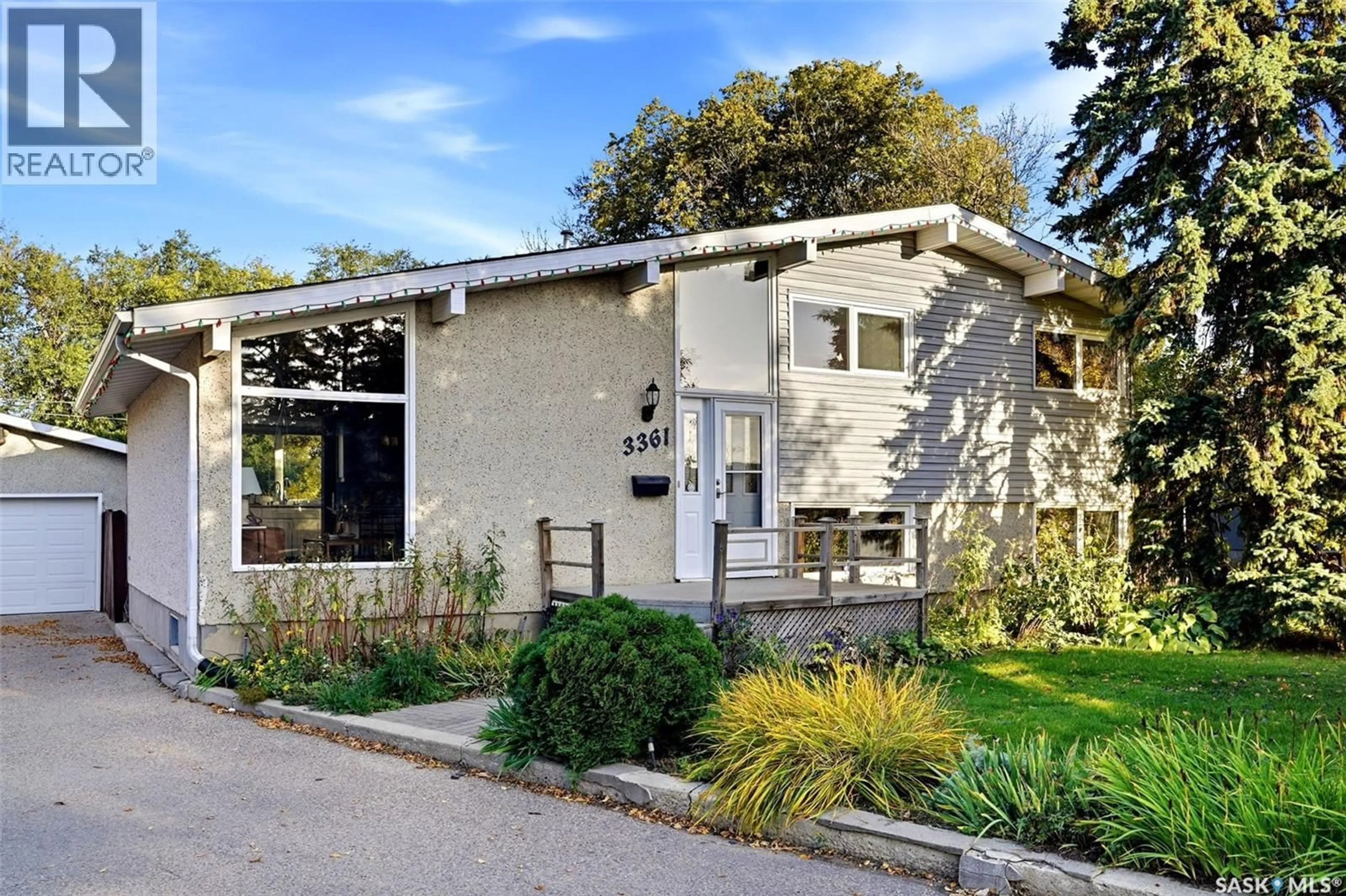 Home with brick exterior material, street for 3361 WASCANA STREET, Regina Saskatchewan S4S2H2