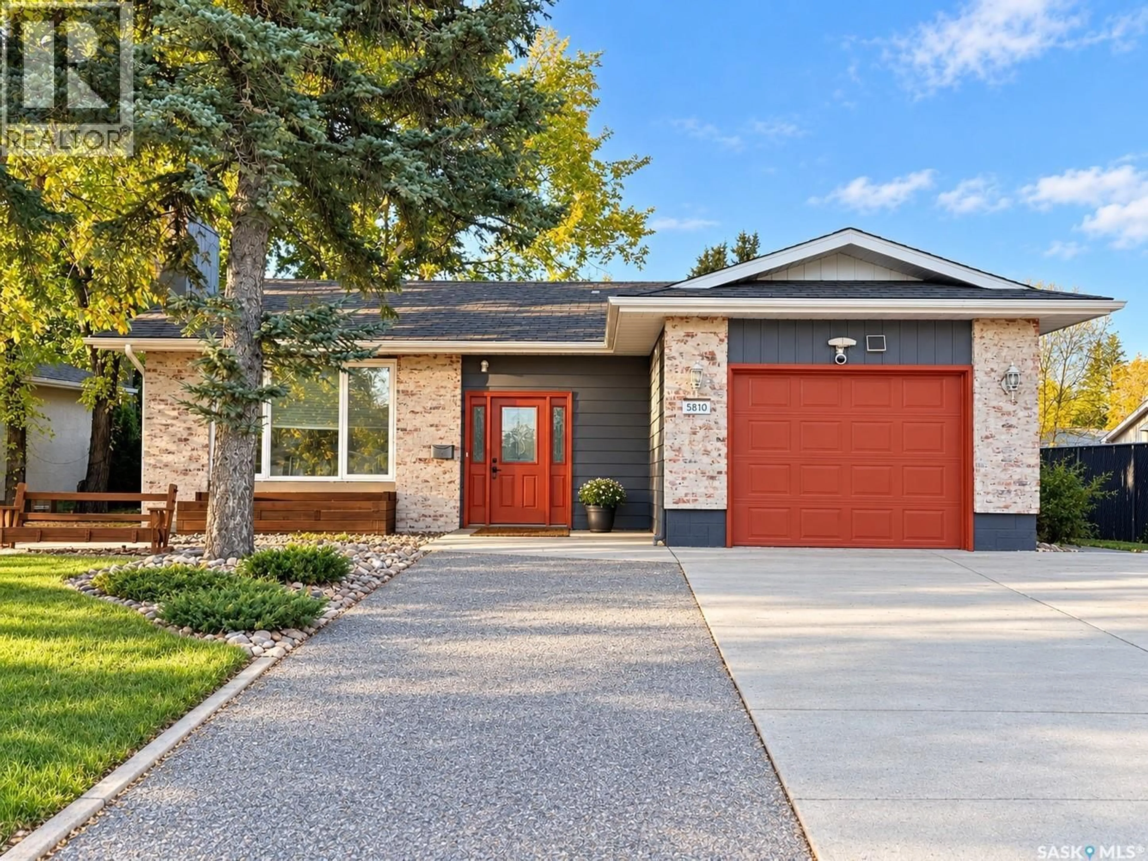 Home with brick exterior material, street for 5810 SHERWOOD DRIVE, Regina Saskatchewan S4T6Y7