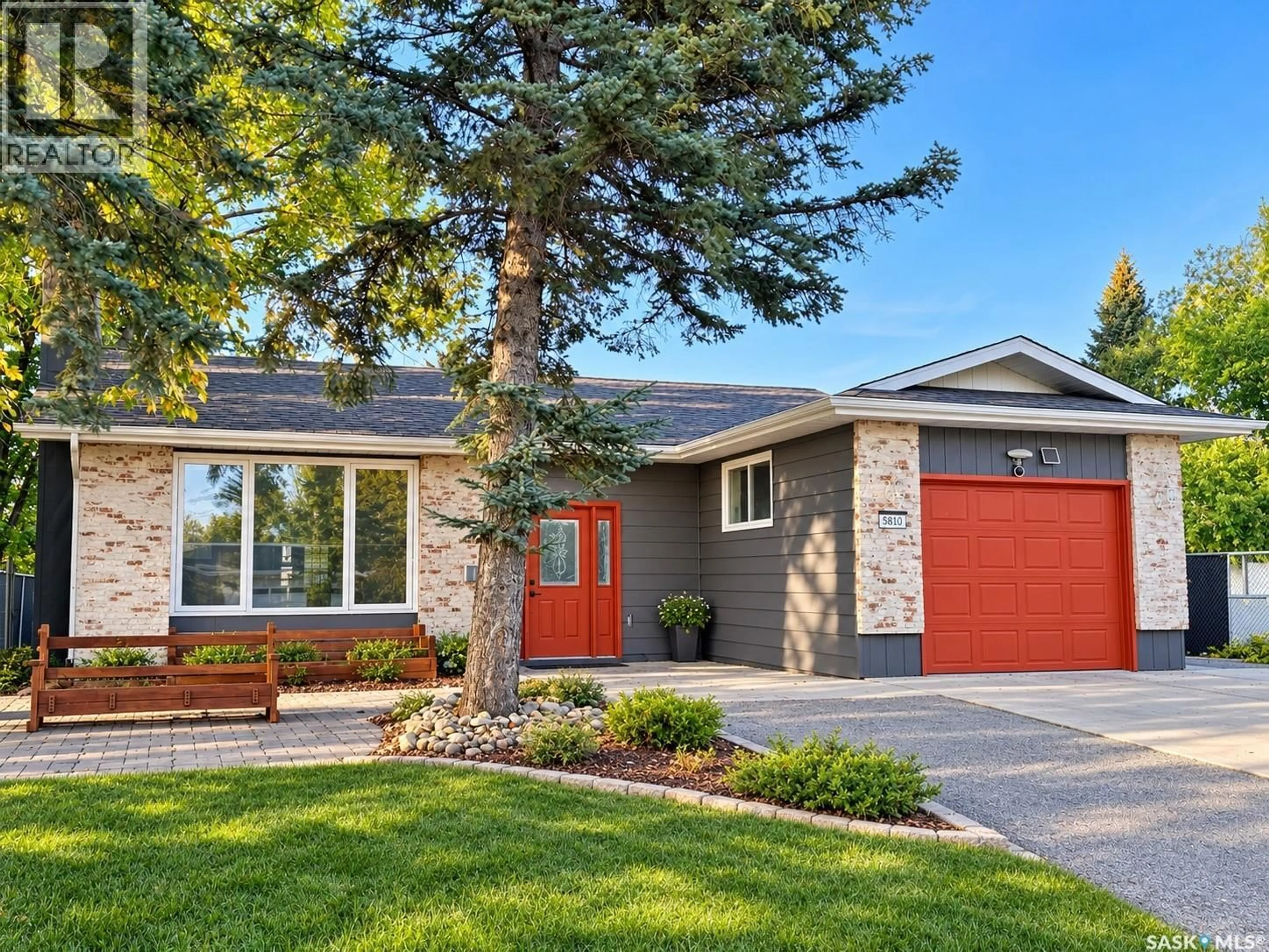 Home with brick exterior material, street for 5810 SHERWOOD DRIVE, Regina Saskatchewan S4T6Y7