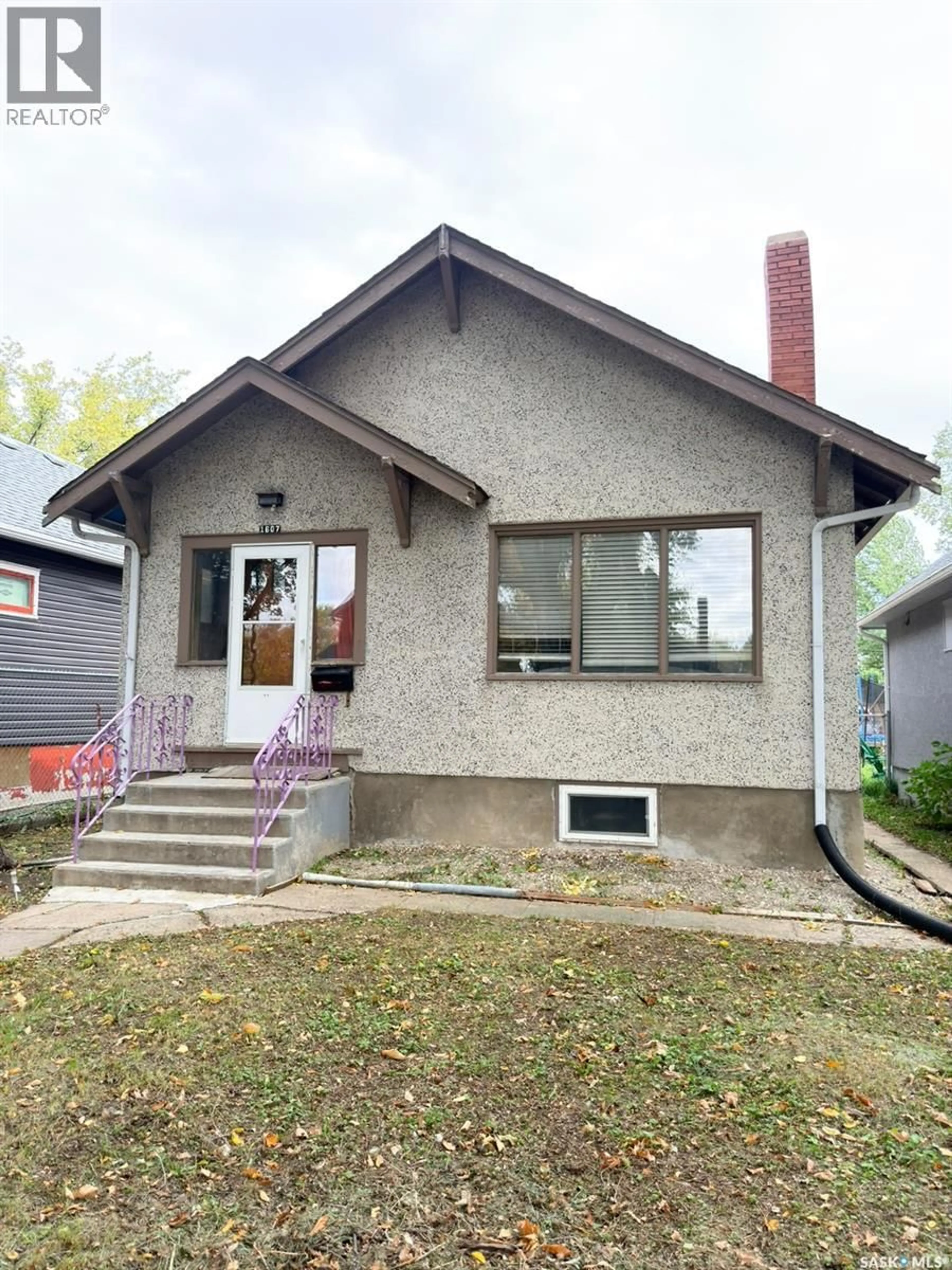 Home with vinyl exterior material, street for 1607 ATHOL STREET, Regina Saskatchewan S4T3E2