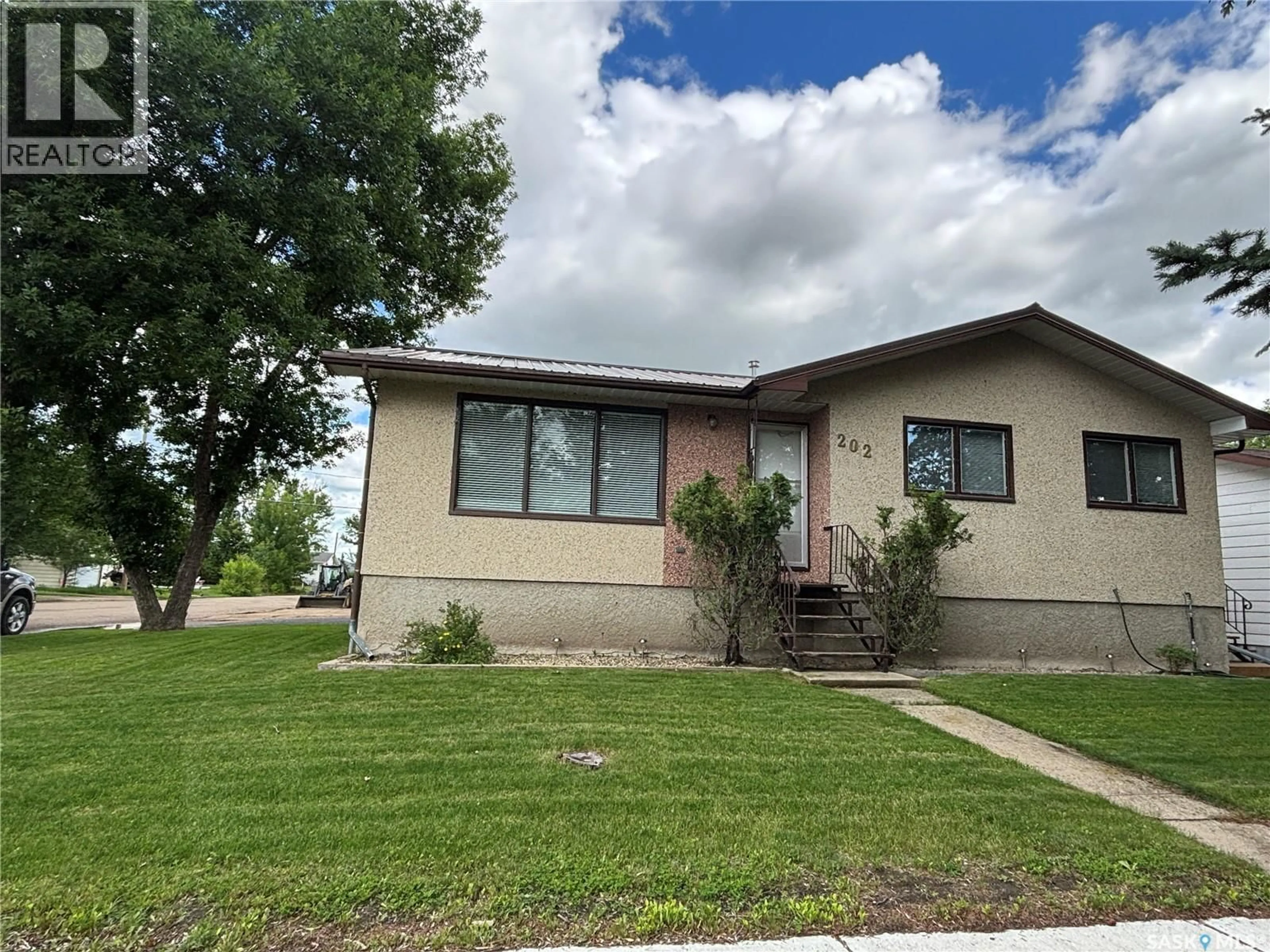Home with vinyl exterior material, street for 202 HERBERT STREET, Maple Creek Saskatchewan S0N1N0