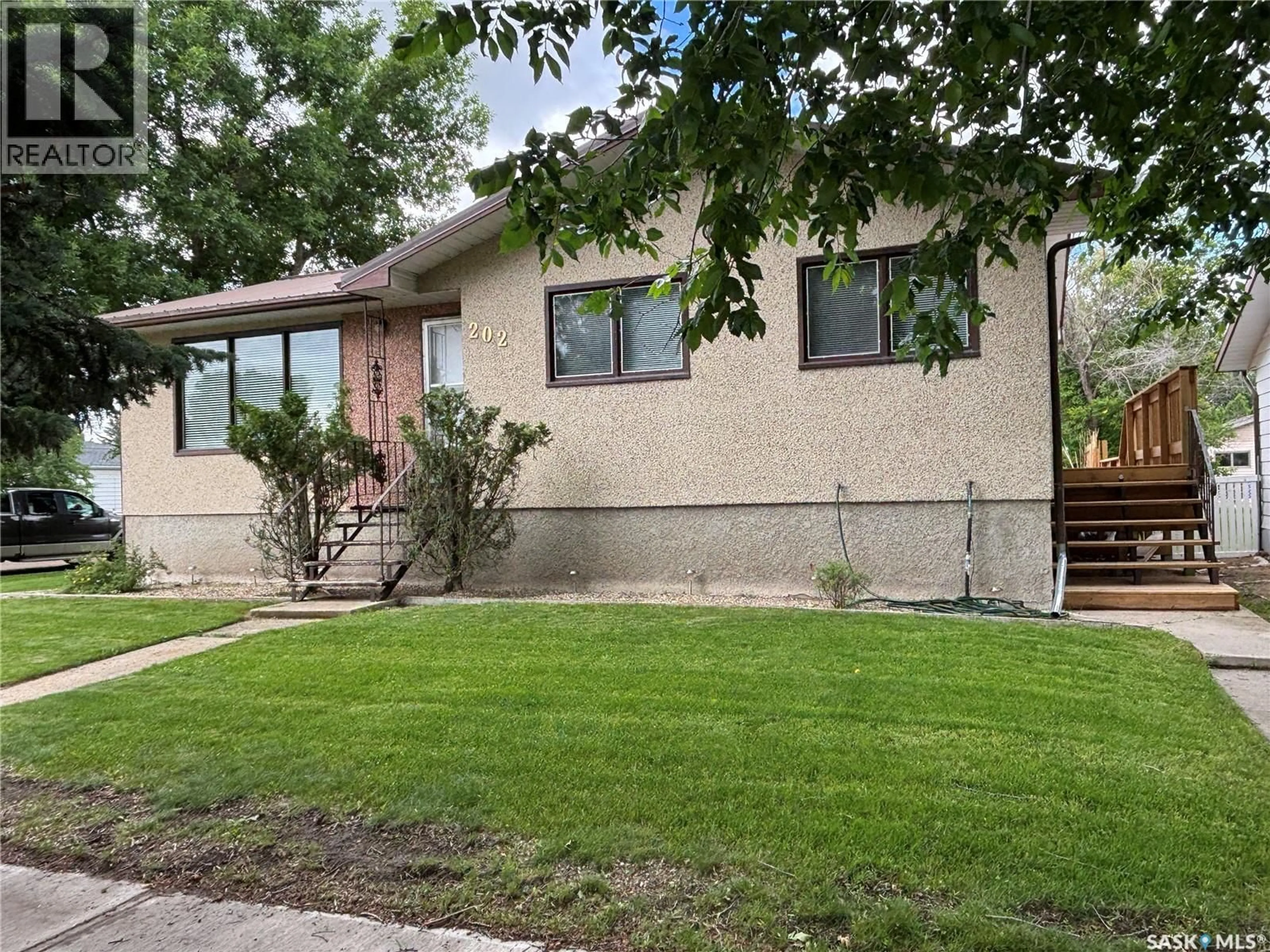 Home with vinyl exterior material, street for 202 HERBERT STREET, Maple Creek Saskatchewan S0N1N0