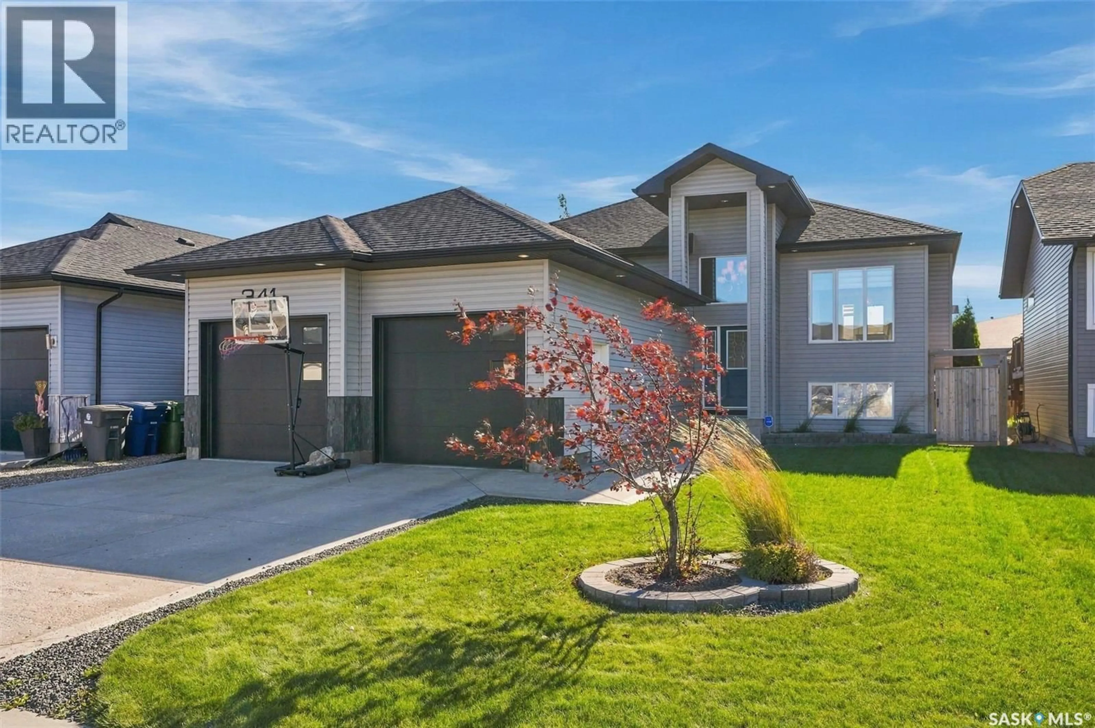Home with brick exterior material, street for 341 HAICHERT STREET, Warman Saskatchewan S0K4S3