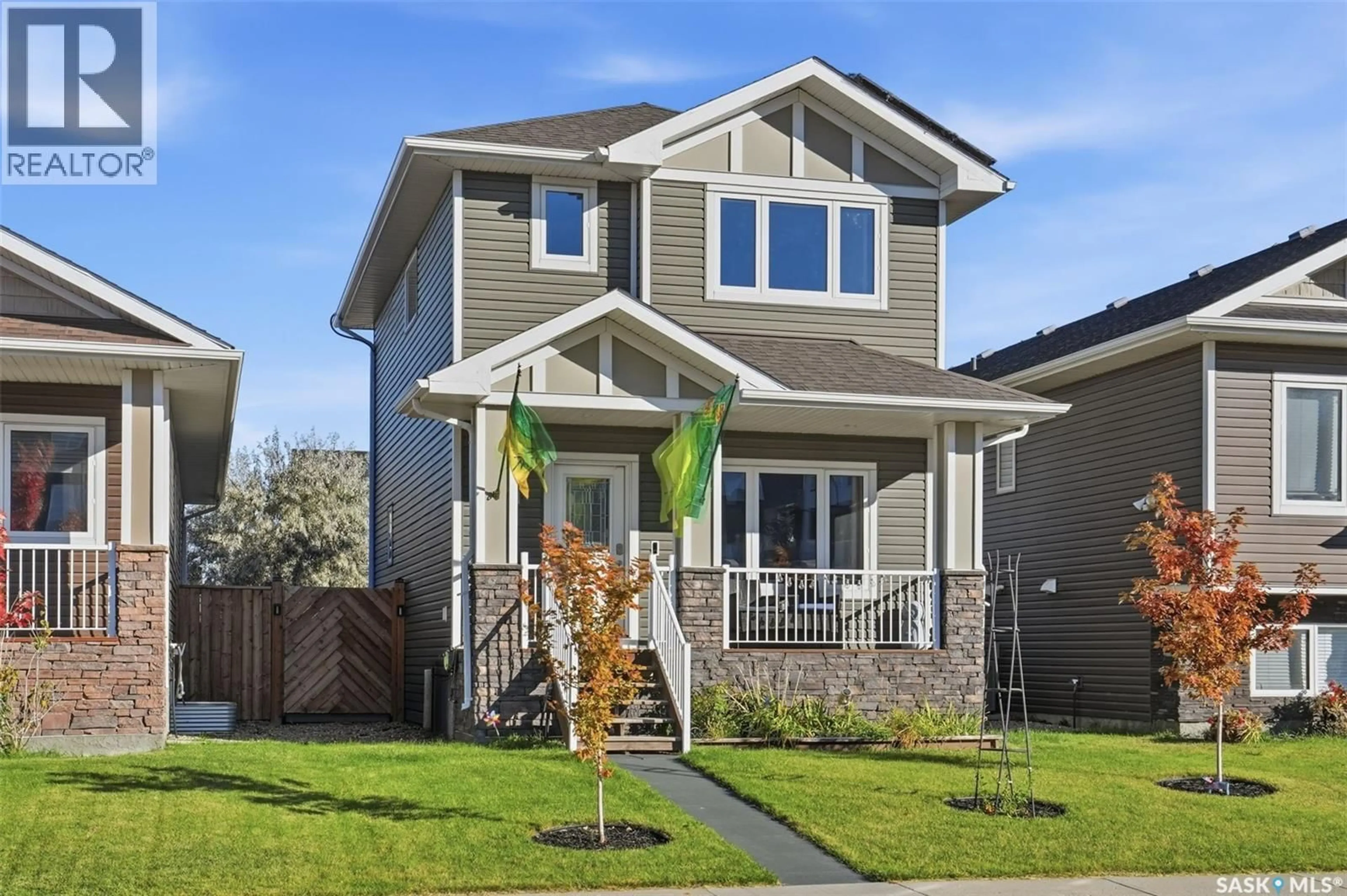 Home with vinyl exterior material, street for 1005 PARR HILL DRIVE, Martensville Saskatchewan S0K2T1