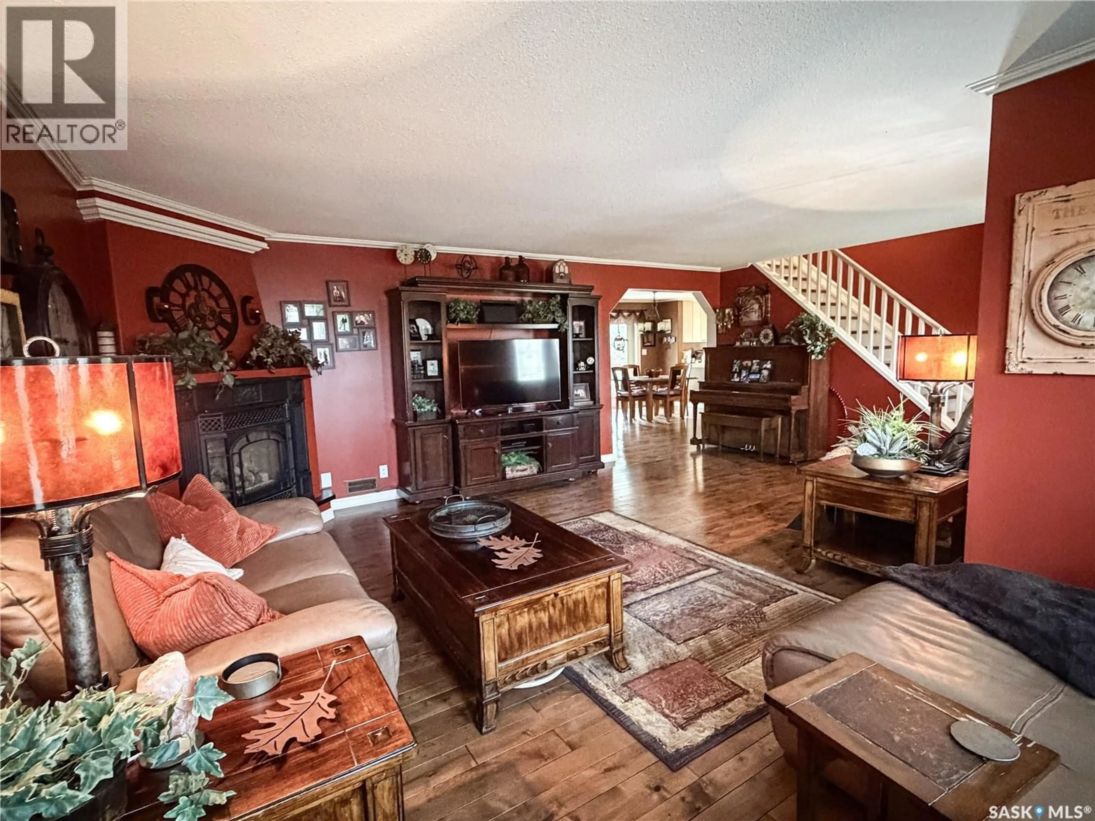 Living room with furniture, wood/laminate floor for 101 2ND AVENUE, Pierceland Saskatchewan S0M2K0