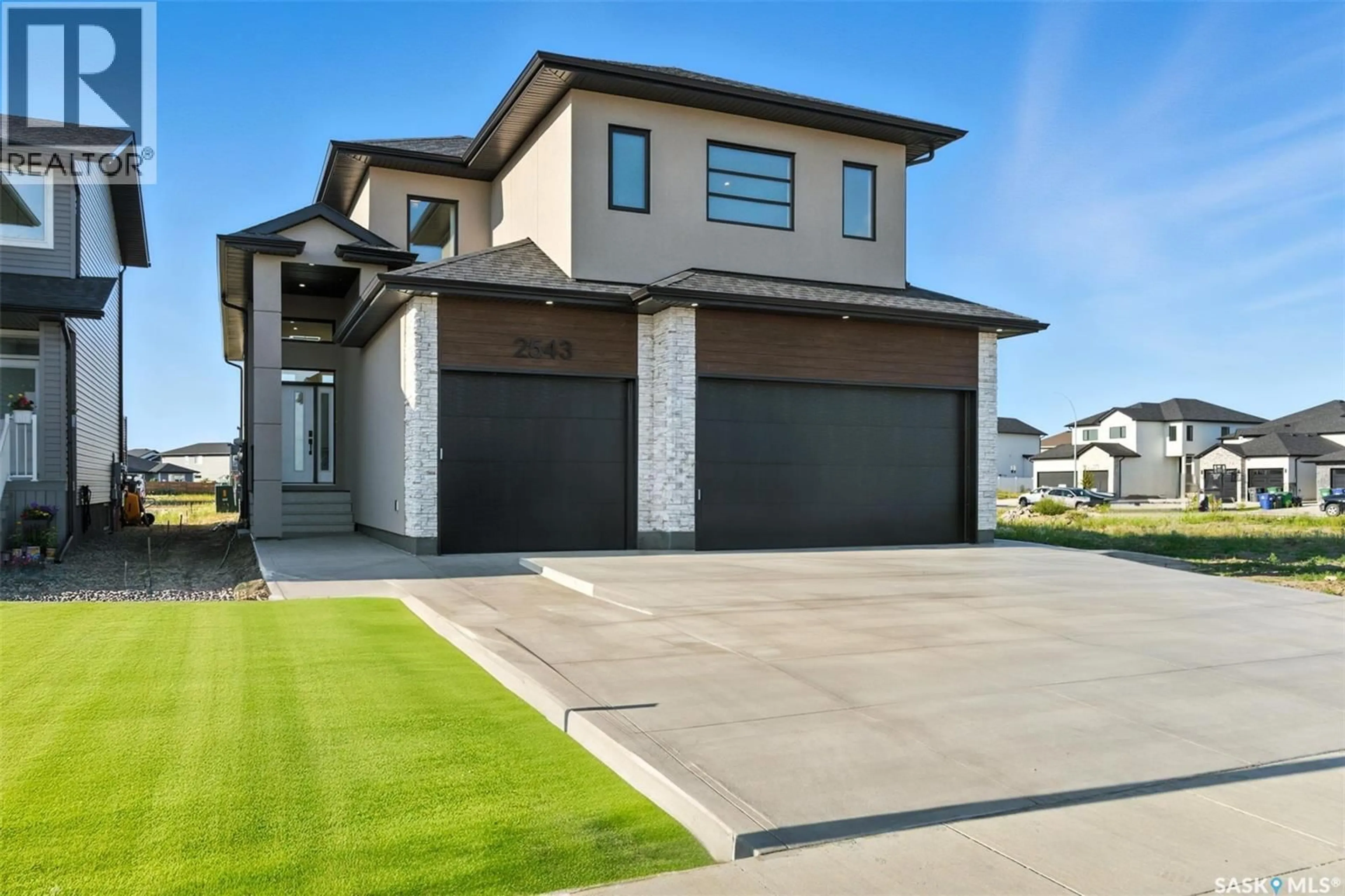 Home with vinyl exterior material, street for 2543 ROSEWOOD DRIVE, Saskatoon Saskatchewan S7V0L8