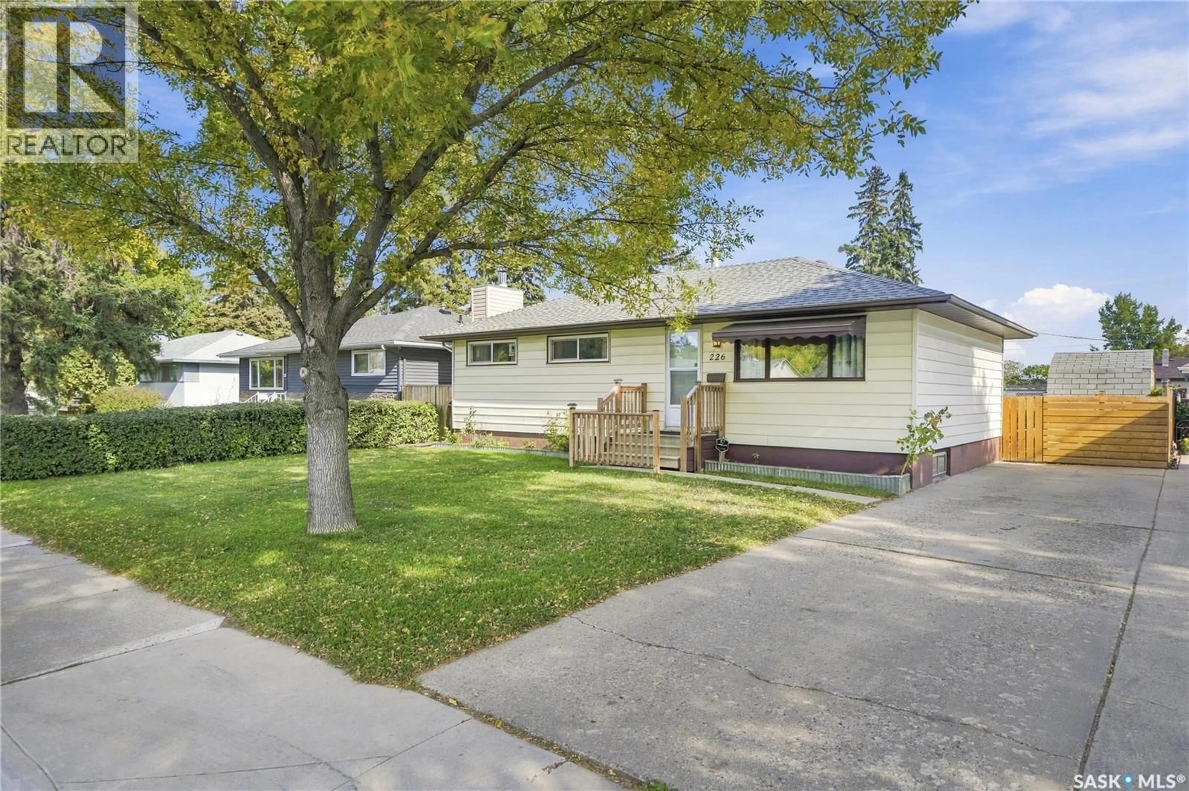 Home with vinyl exterior material, street for 226 U AVENUE, Saskatoon Saskatchewan S7L3C5