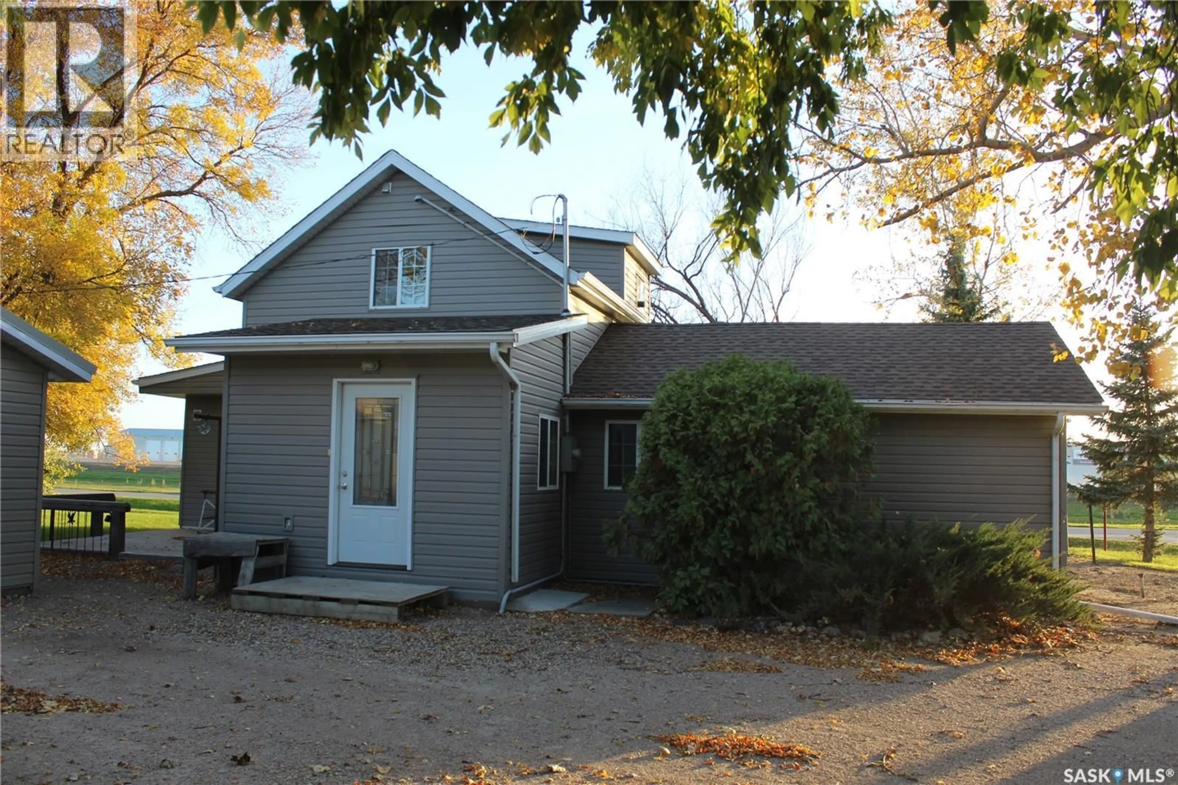 Home with vinyl exterior material, street for 102 MAINPRIZE STREET, Midale Saskatchewan S0C1S0