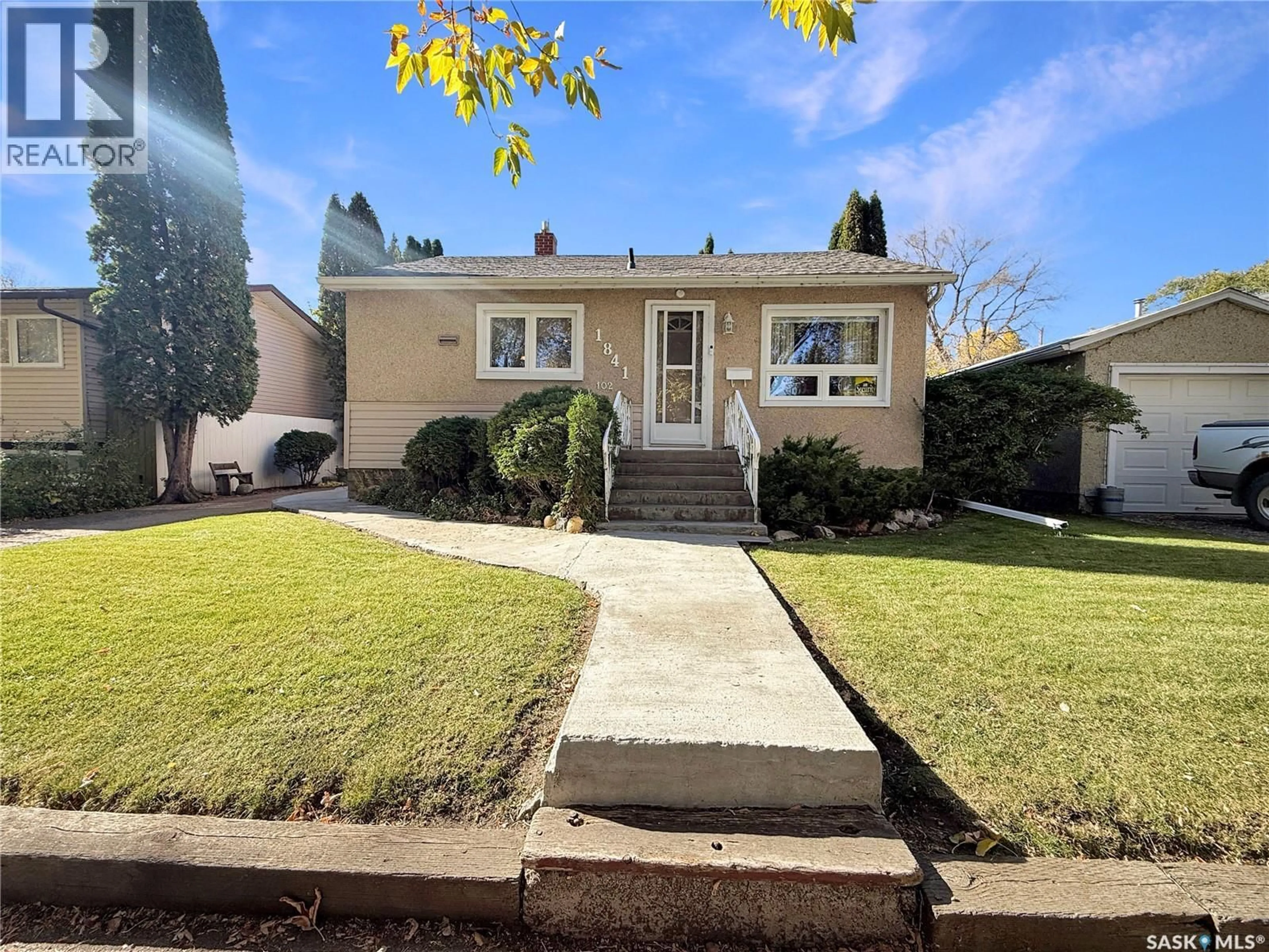 Home with vinyl exterior material, street for 1841 102ND STREET, North Battleford Saskatchewan S9A1H4