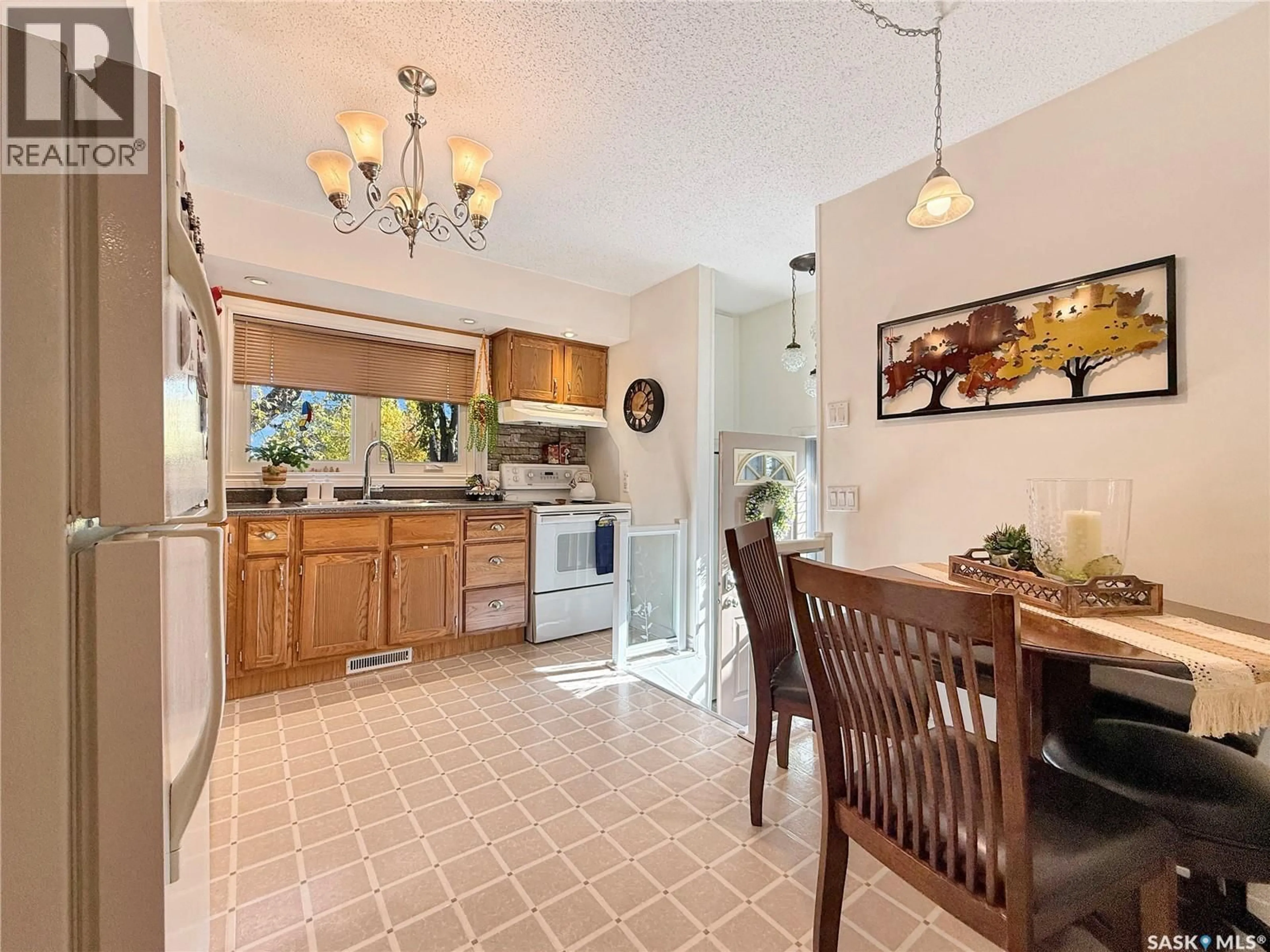 Open concept kitchen, ceramic/tile floor for 1841 102ND STREET, North Battleford Saskatchewan S9A1H4