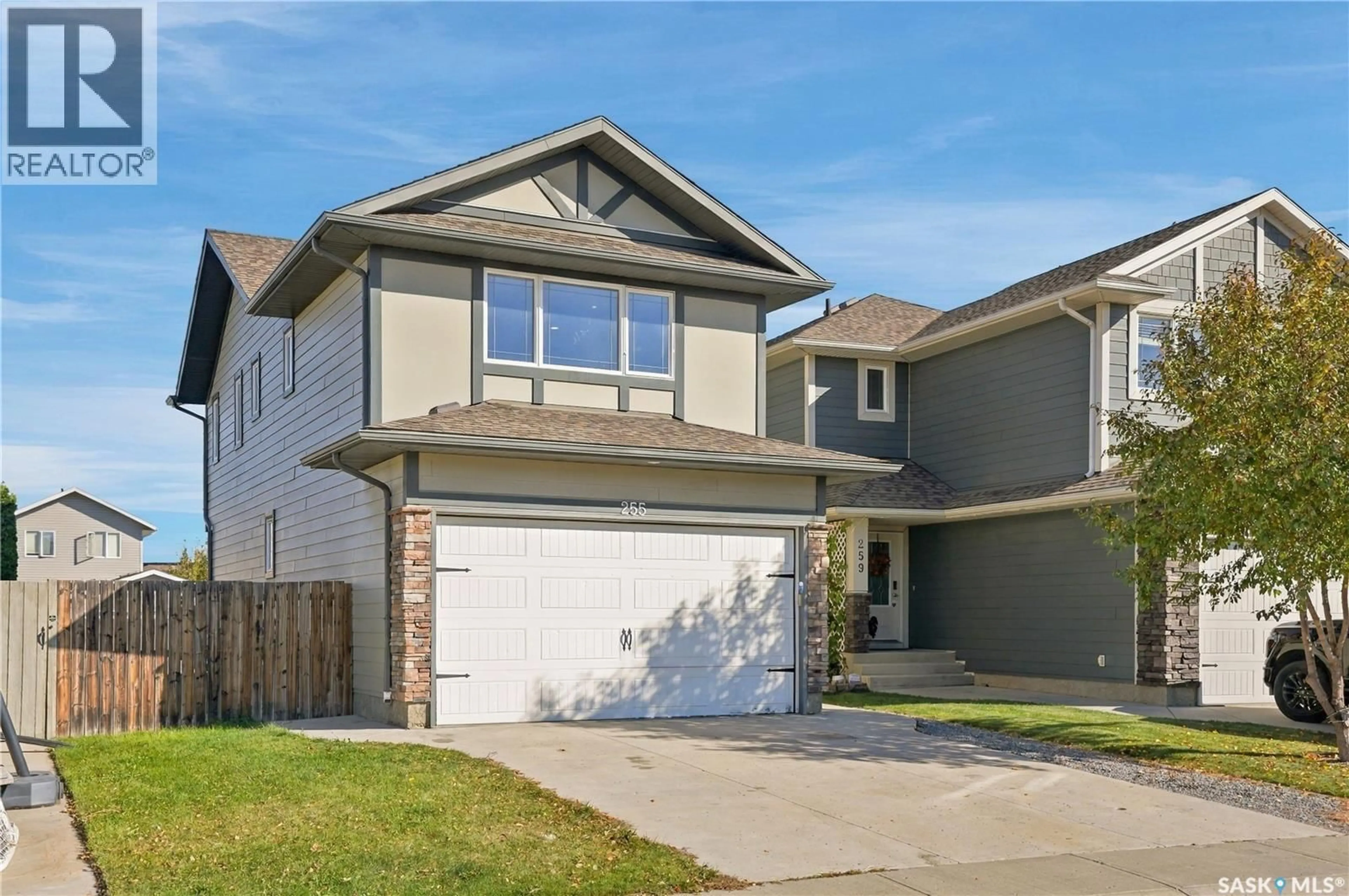 Home with vinyl exterior material, street for 255 MCBETH CRESCENT, Saskatoon Saskatchewan S7T0L6