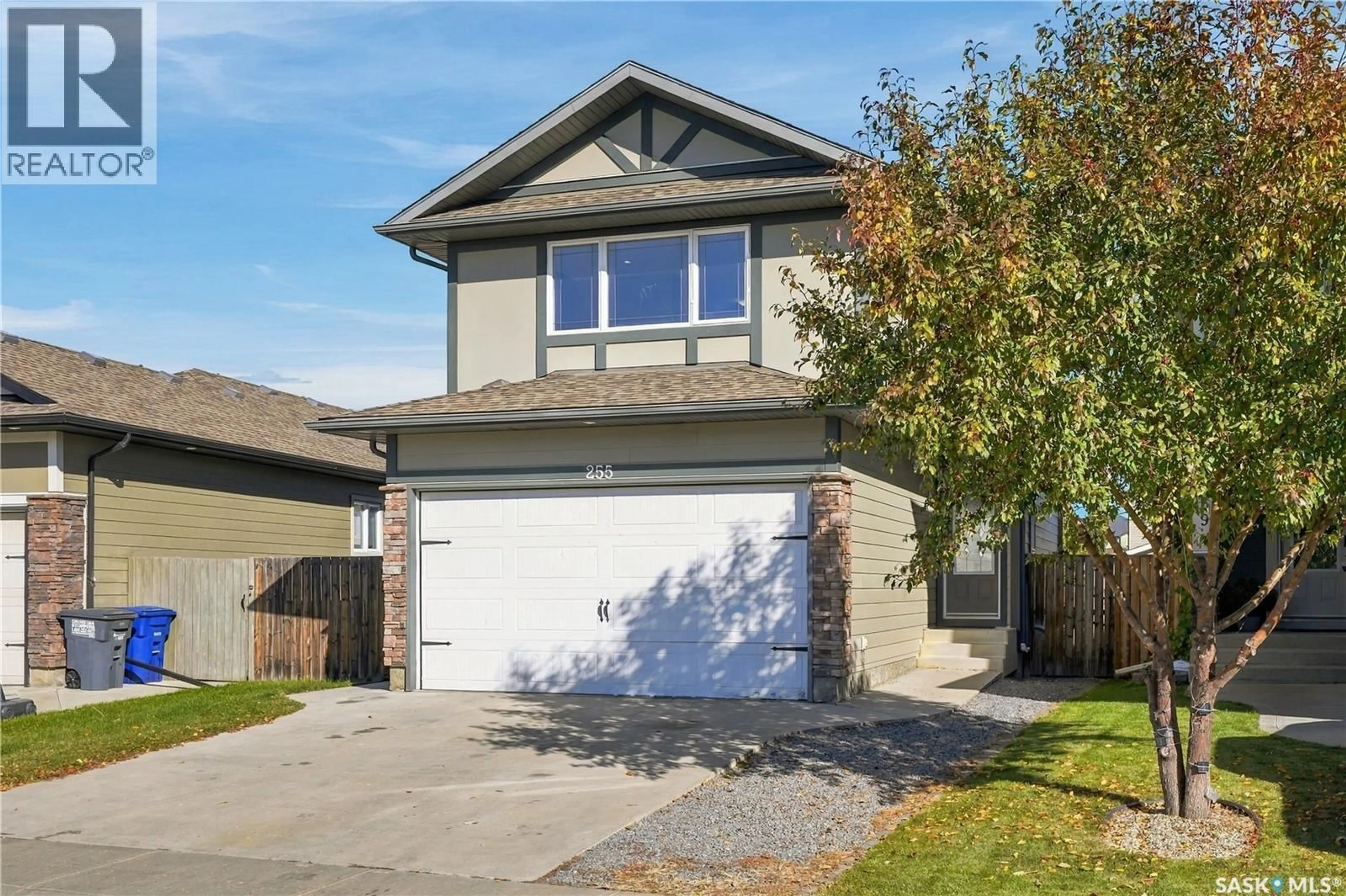 Home with vinyl exterior material, street for 255 MCBETH CRESCENT, Saskatoon Saskatchewan S7T0L6