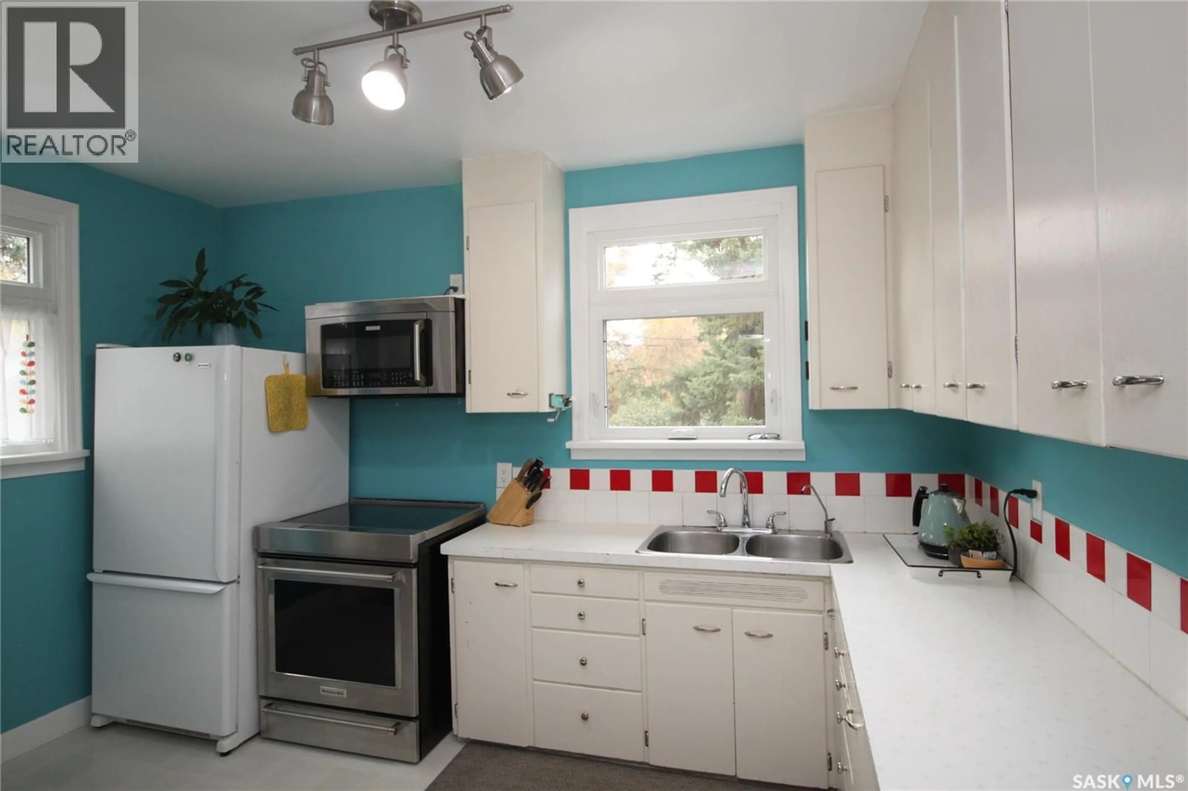 Standard kitchen, ceramic/tile floor for 1015 H AVENUE, Saskatoon Saskatchewan S7L2C7
