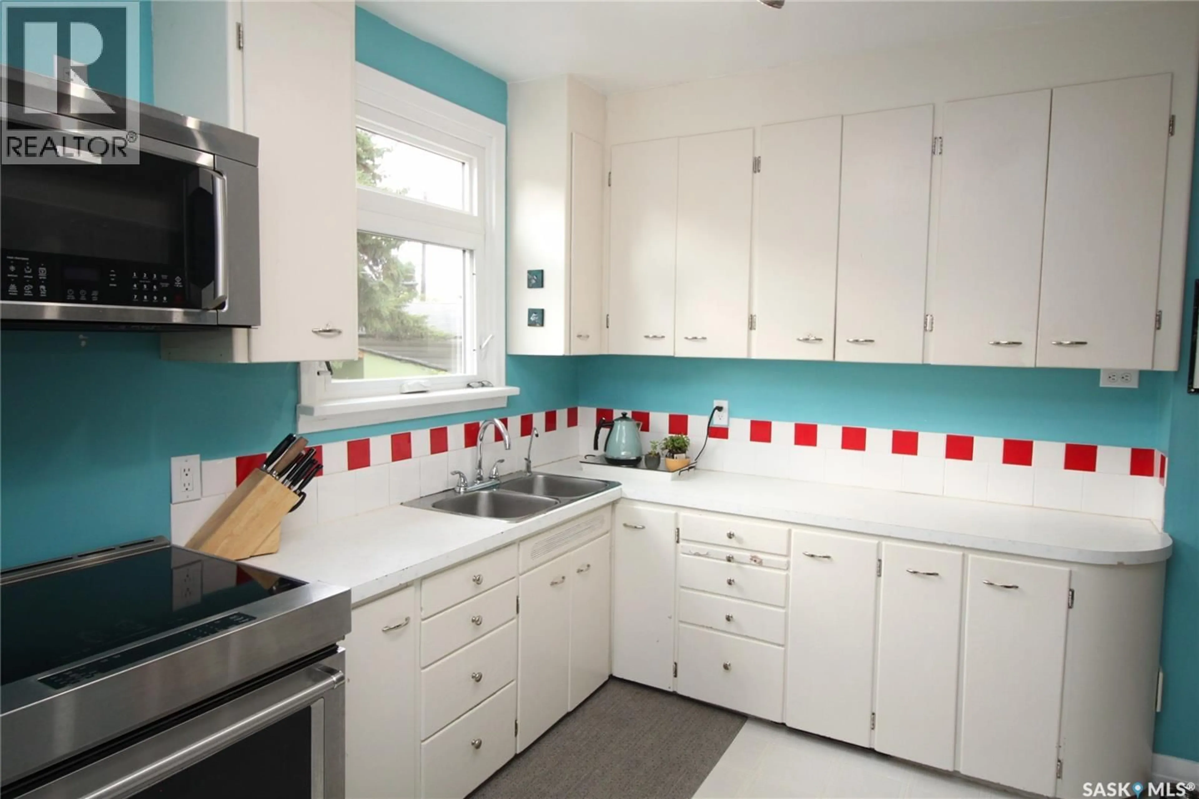 Standard kitchen, ceramic/tile floor for 1015 H AVENUE, Saskatoon Saskatchewan S7L2C7