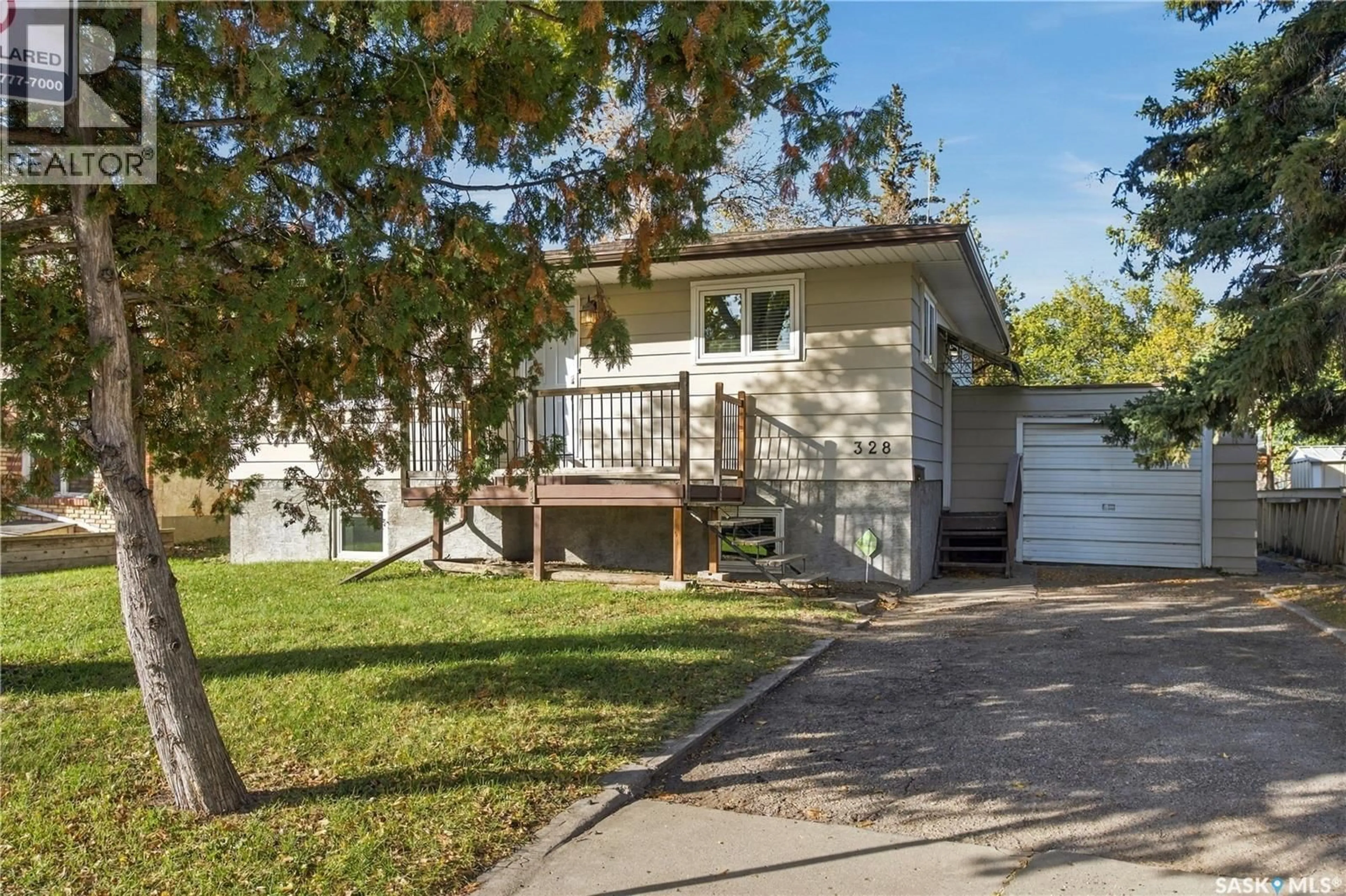 Home with vinyl exterior material, street for E - 328 COLLEGE AVENUE, Regina Saskatchewan S4N0V8