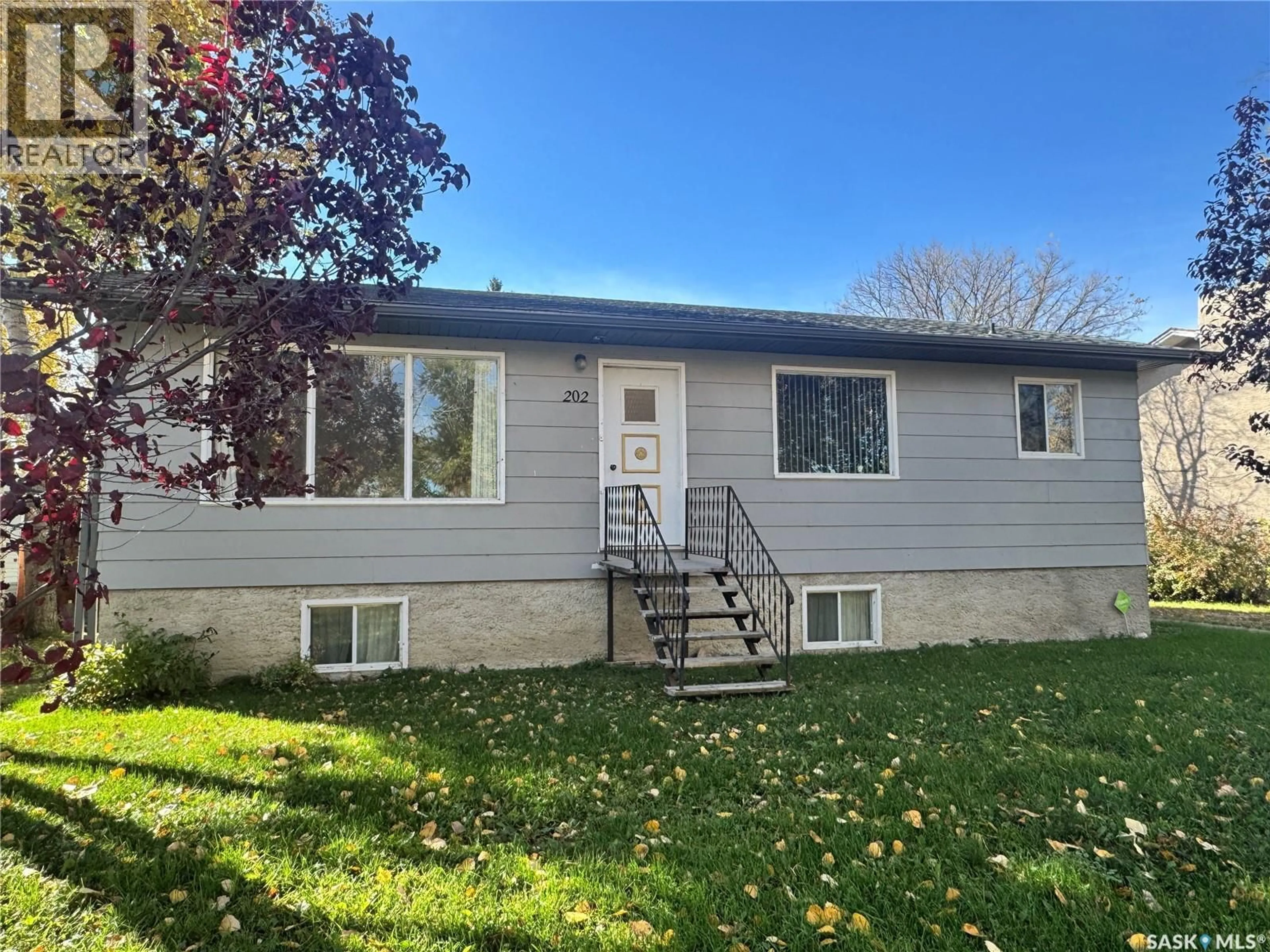 Home with vinyl exterior material, street for 202 4TH AVENUE, Landis Saskatchewan S0K2K0
