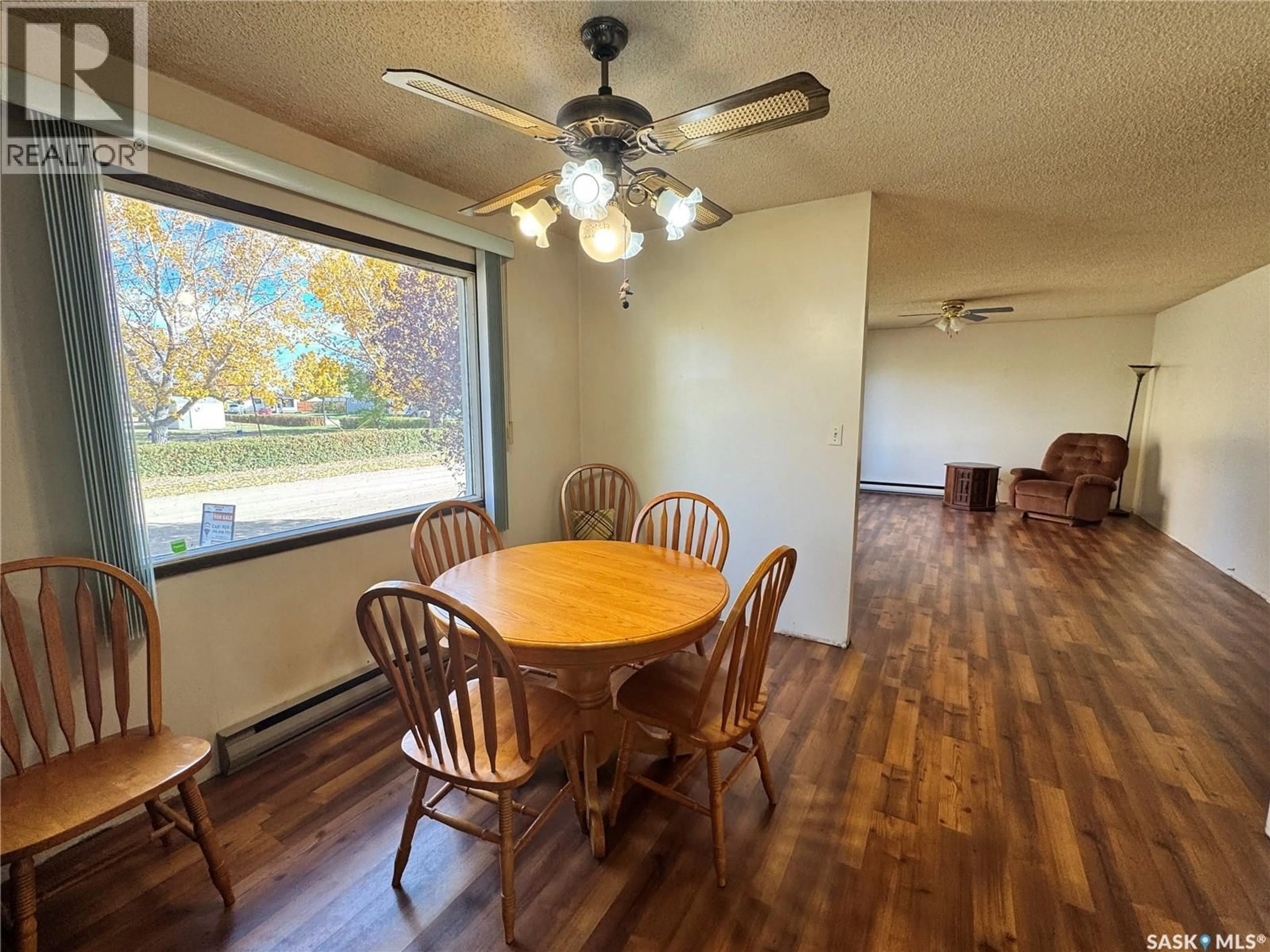 Dining room, wood/laminate floor for 202 4TH AVENUE, Landis Saskatchewan S0K2K0