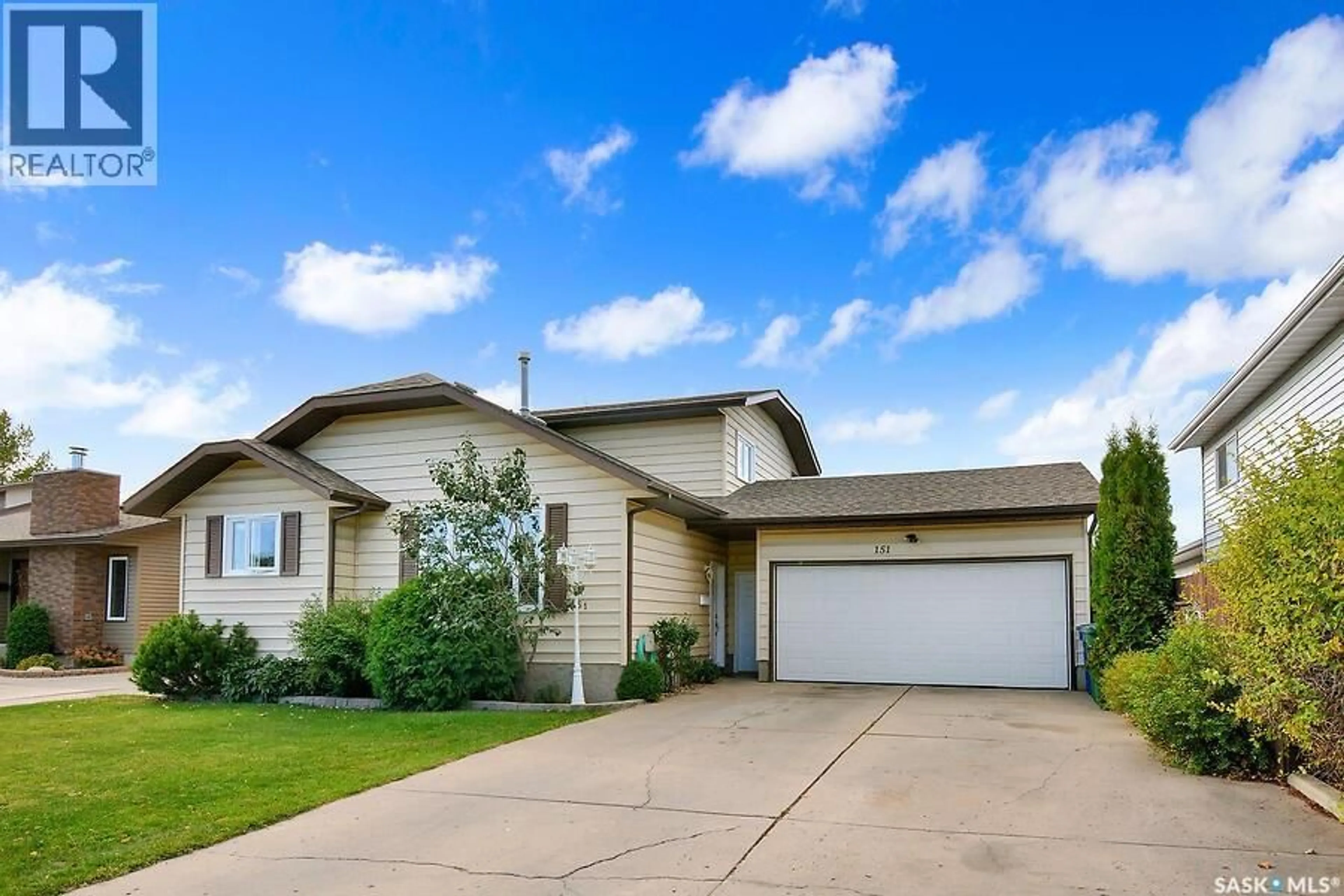 Home with vinyl exterior material, street for 151 HUNT ROAD, Saskatoon Saskatchewan S7L6E6