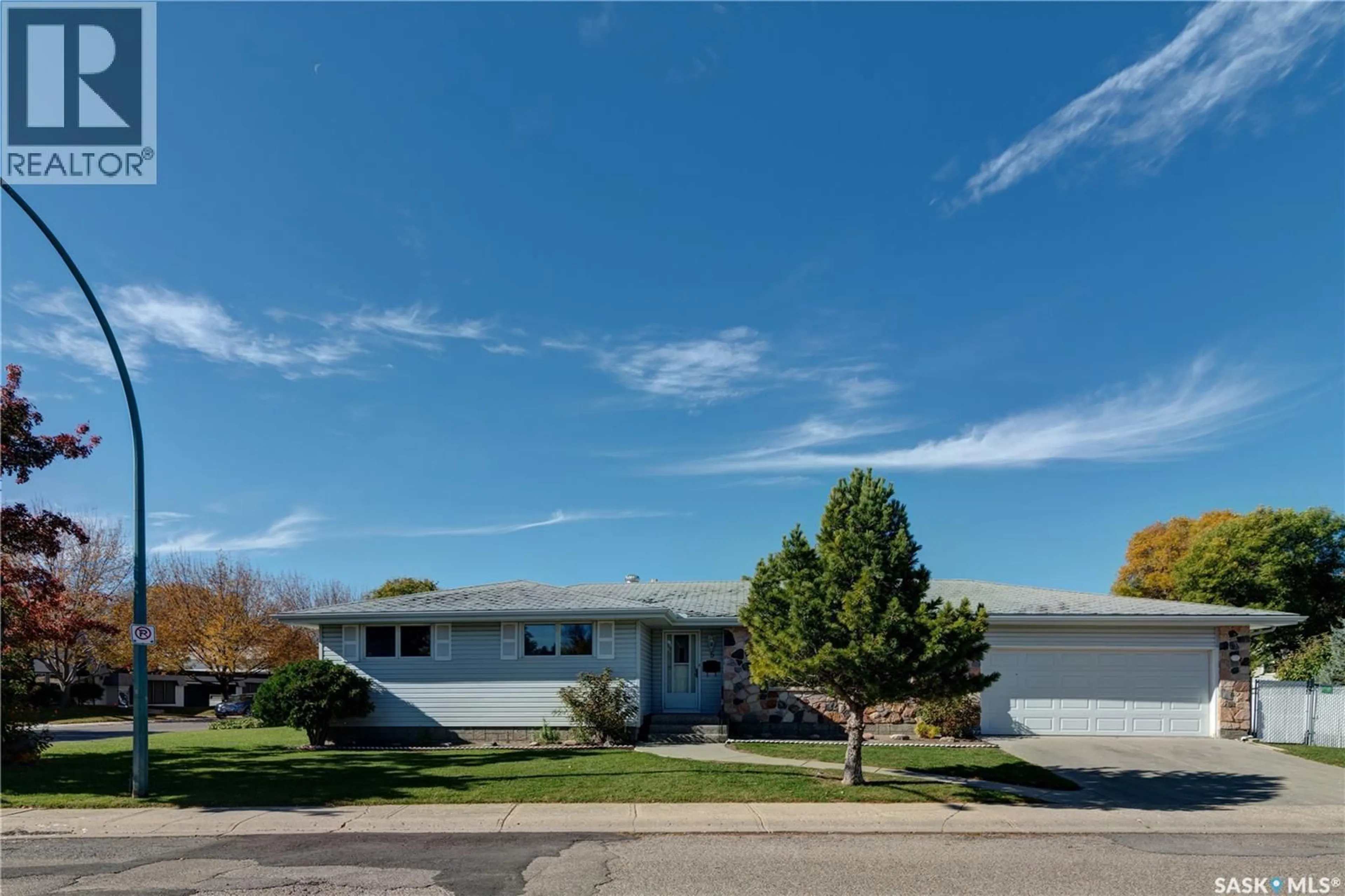 Home with vinyl exterior material, street for 5 WHEATON CRESCENT, Regina Saskatchewan S4S2Z3
