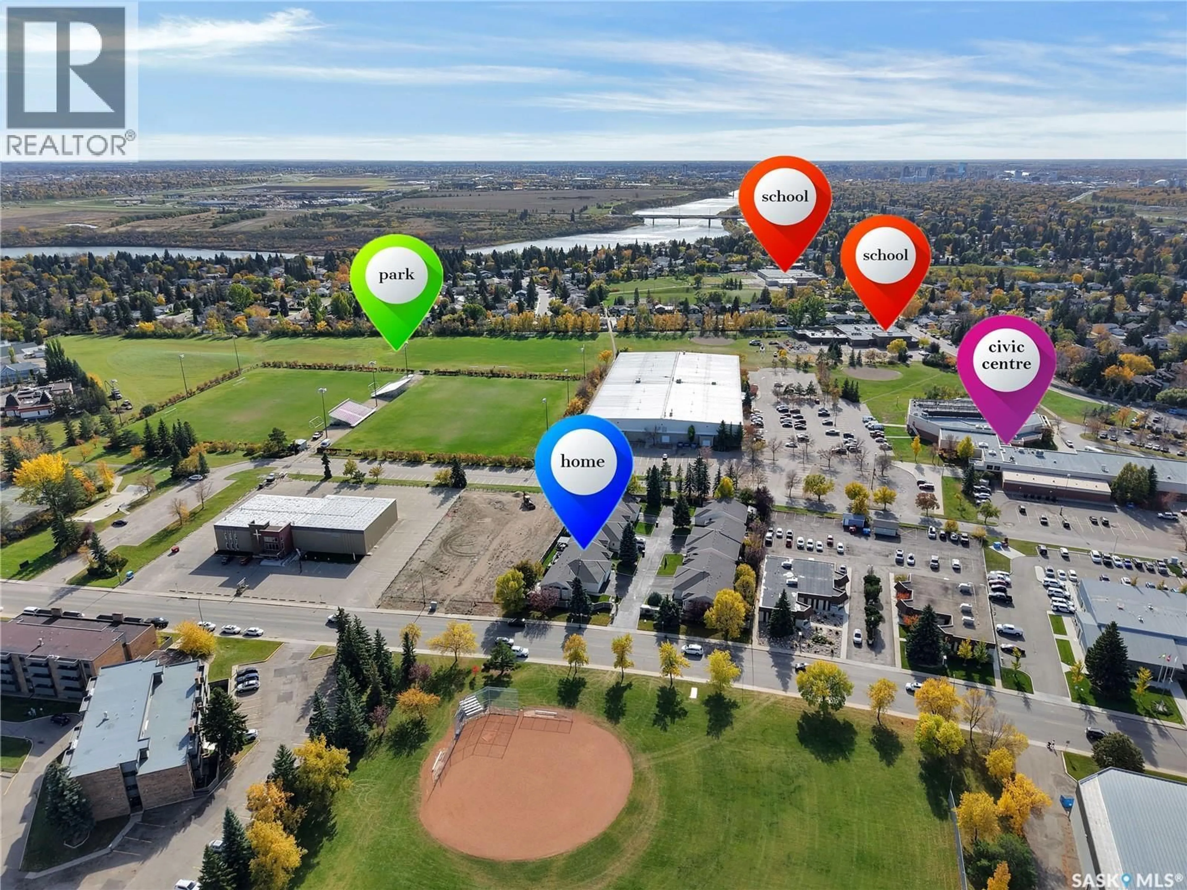 A pic from outside/outdoor area/front of a property/back of a property/a pic from drone, unknown for 135 - 3 PINEHOUSE DRIVE, Saskatoon Saskatchewan S7K5W1