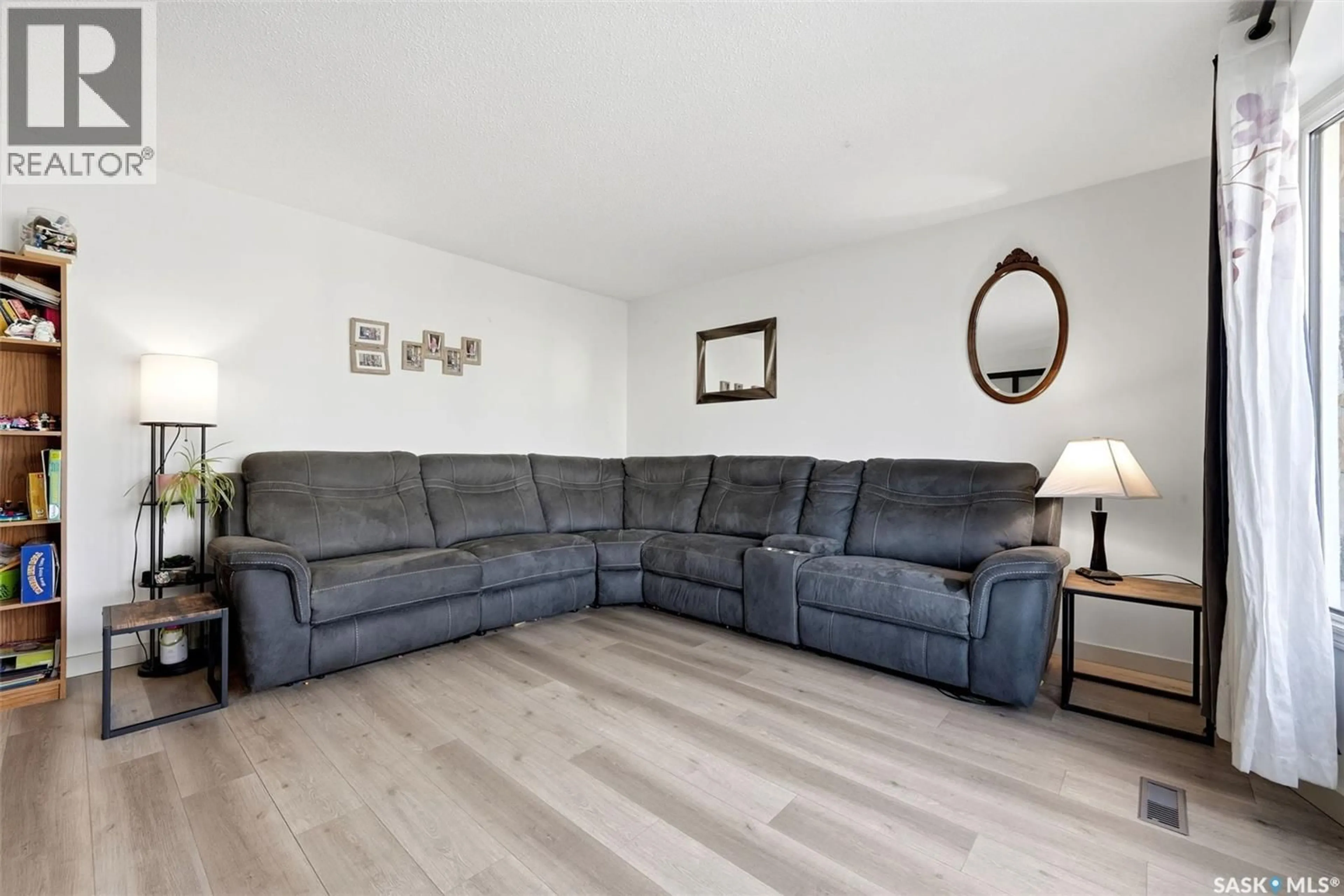 Living room with furniture, unknown for 31 BERENSON AVENUE, Regina Saskatchewan S4T6X4