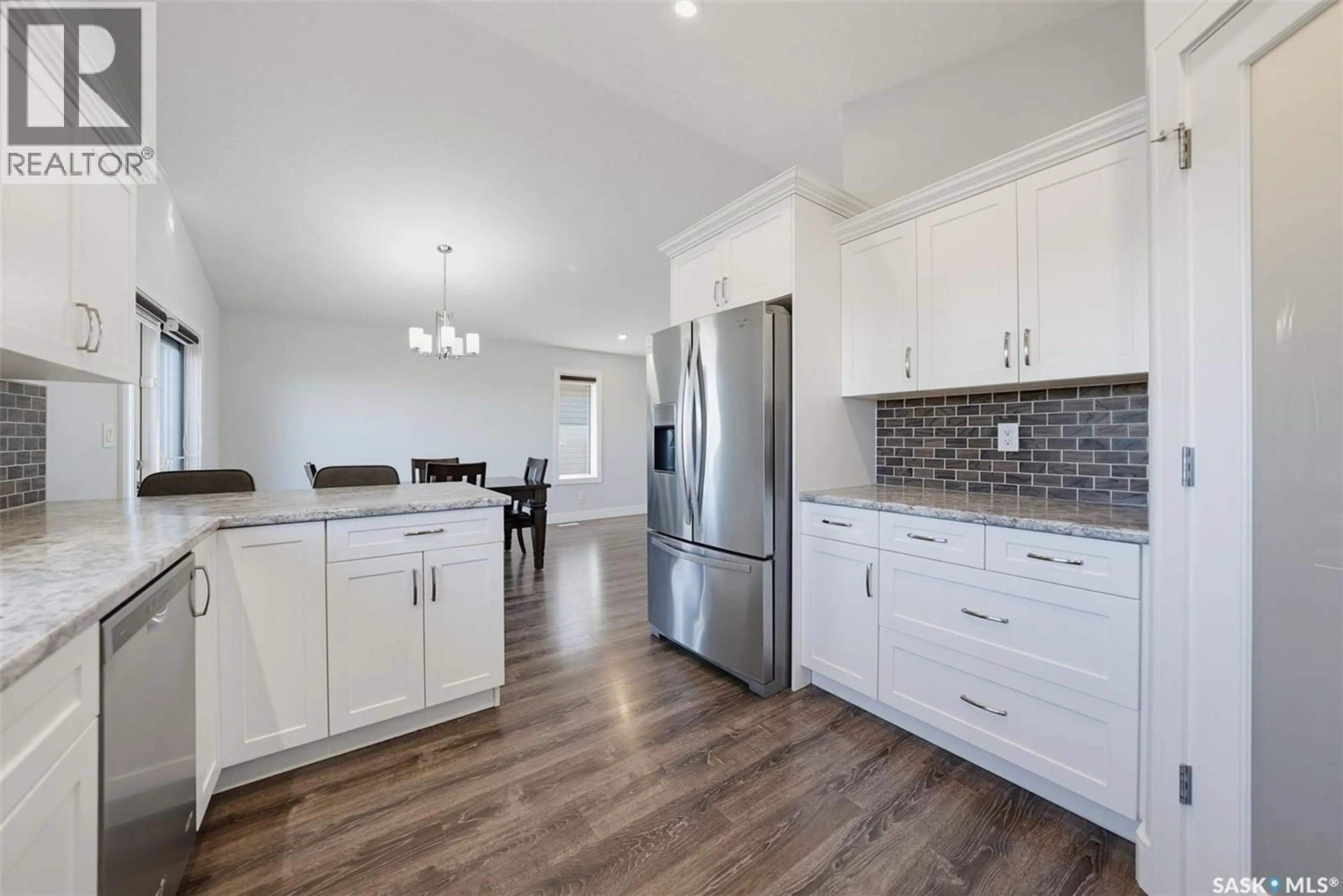 Open concept kitchen, unknown for 309 BASSETT ROAD, Martensville Saskatchewan S0K2T1
